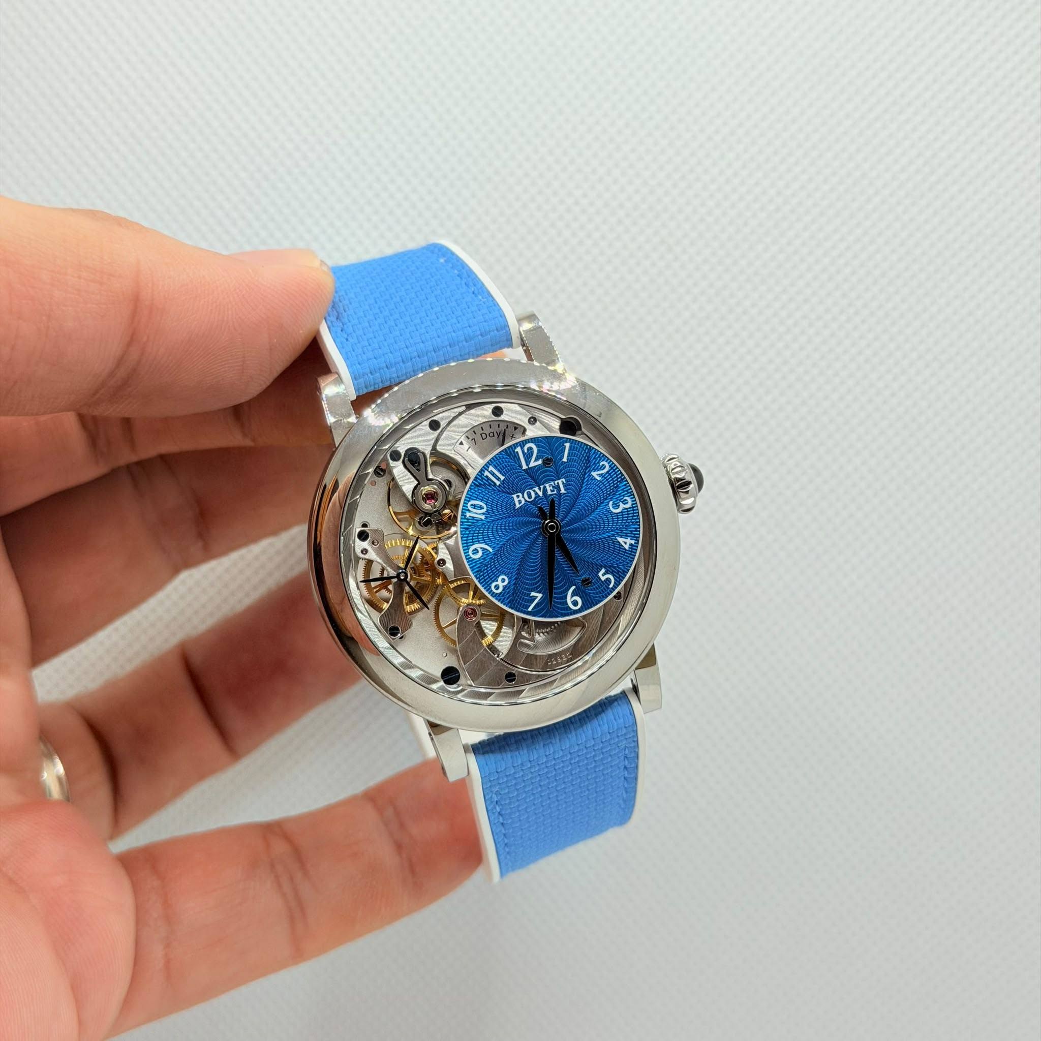 May be an image of wrist watch and text that says '12 10 BOVET و 80 X ر 6'