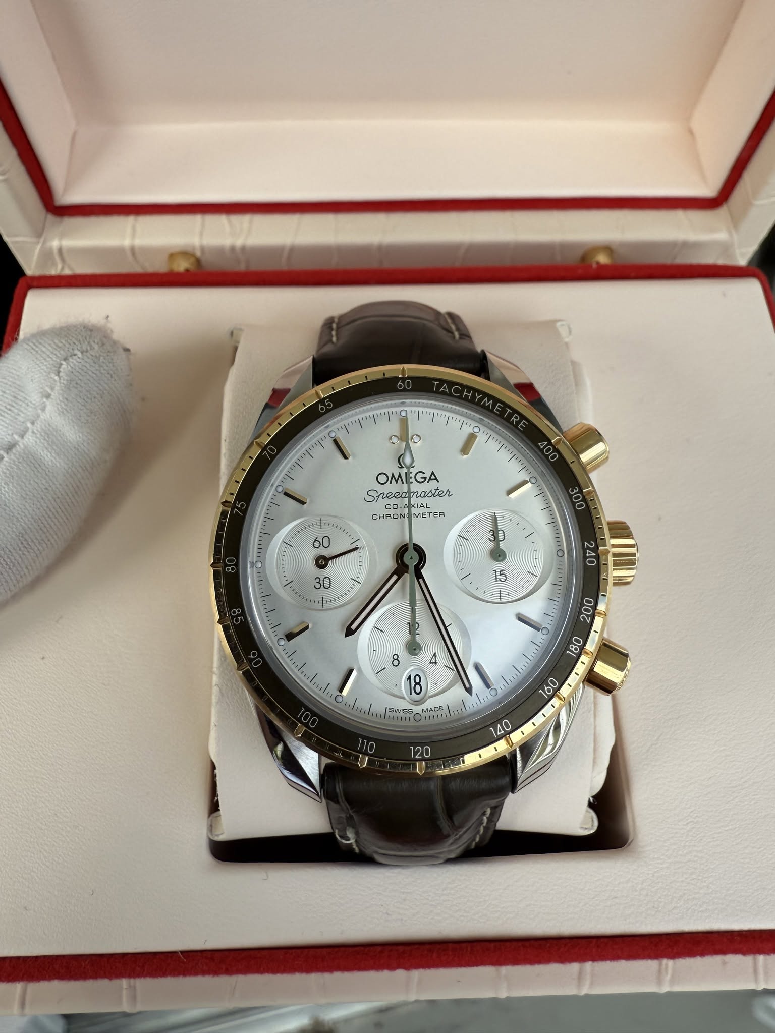 May be an image of wrist watch and text