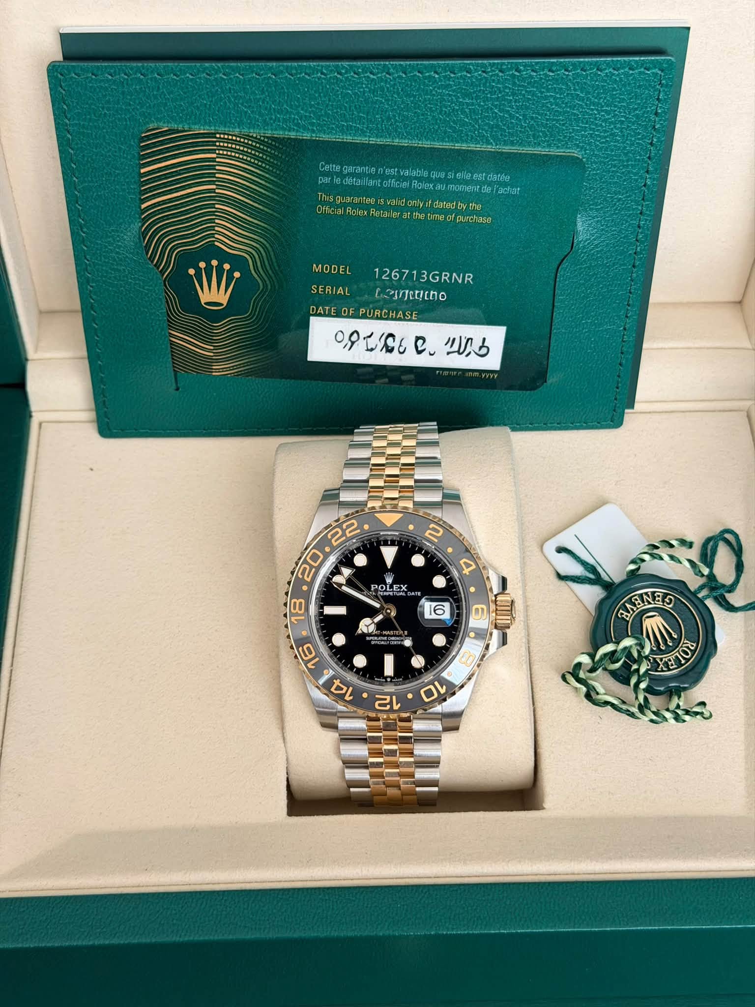May be an image of wrist watch and text