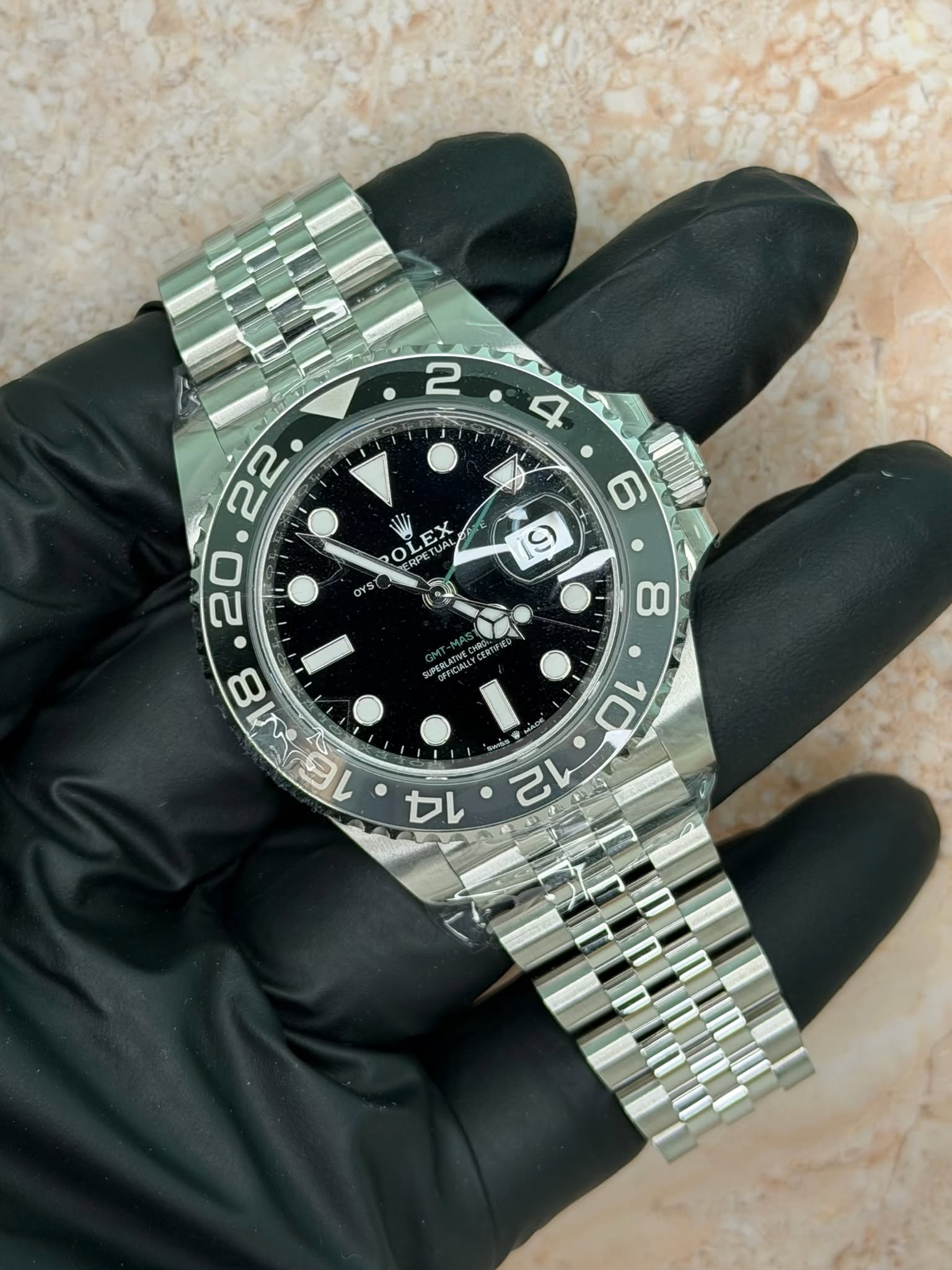 May be an image of wrist watch and text