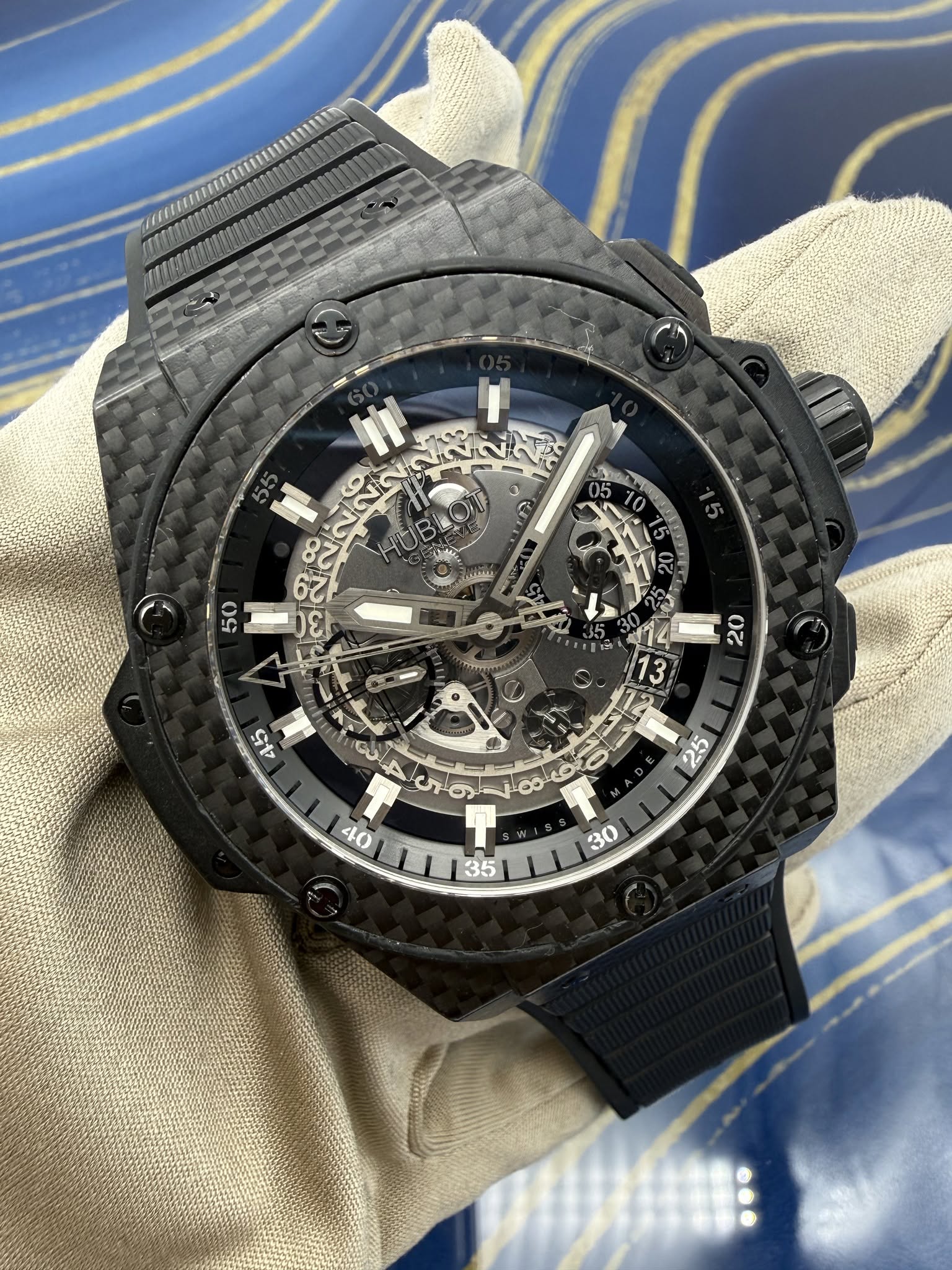 May be an image of wrist watch and text