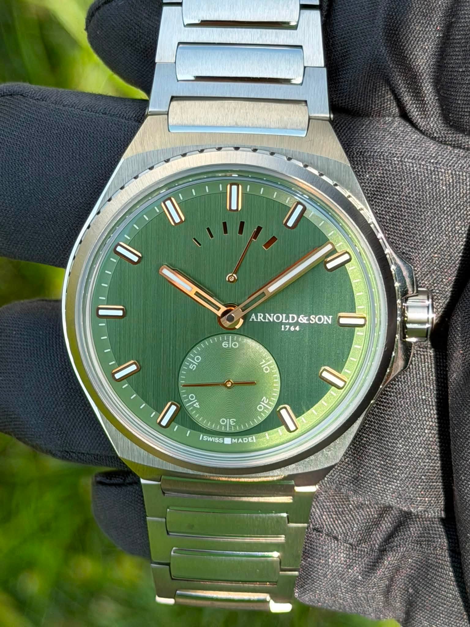 May be an image of wrist watch and text that says 'D ARNOLD ARNOLD&SON &SON 1764 月 6l0 slo l' 1l0 ® 1 lo 4l0 2 이 SWISS MADEL'