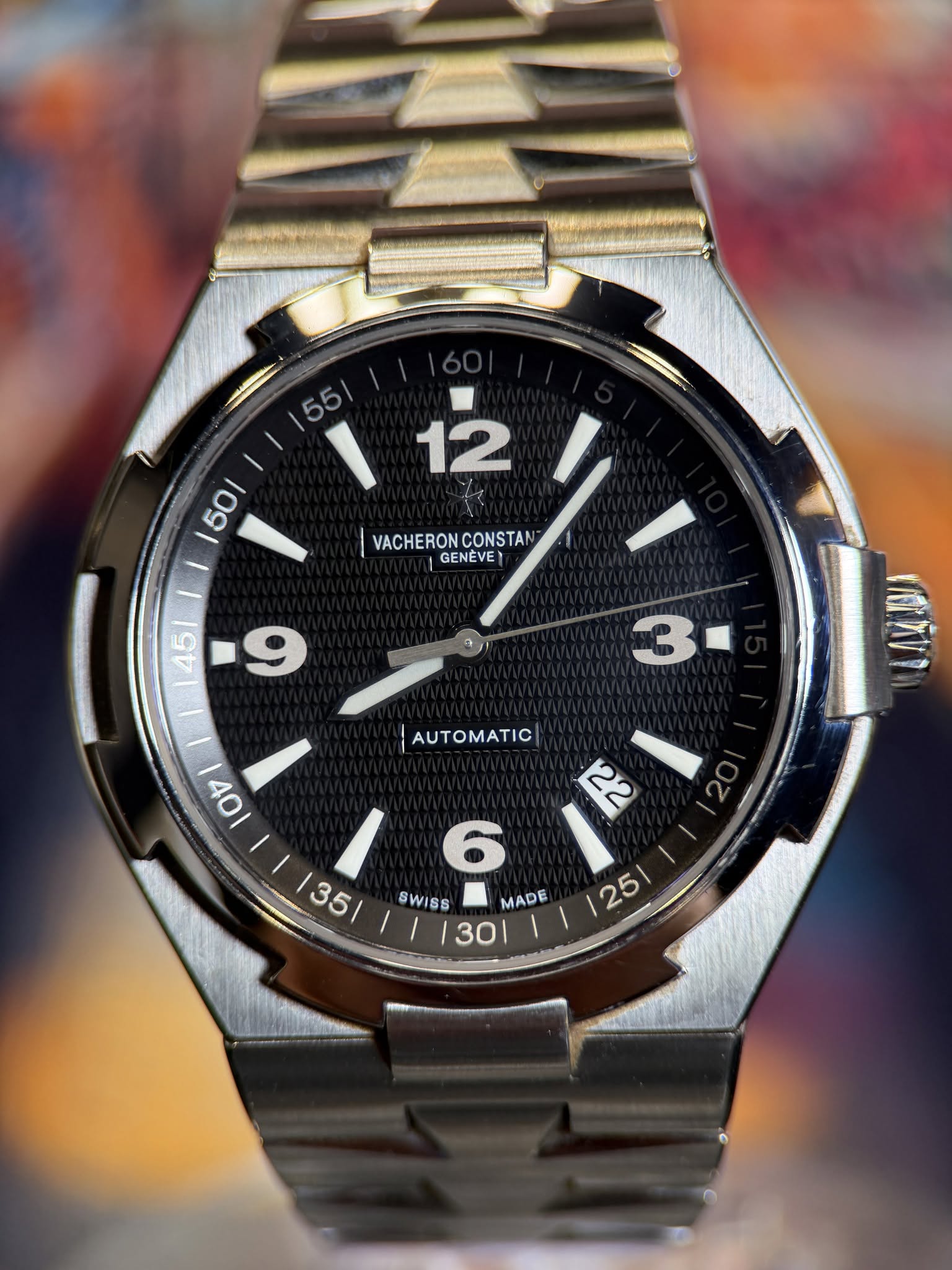 May be an image of wrist watch and text