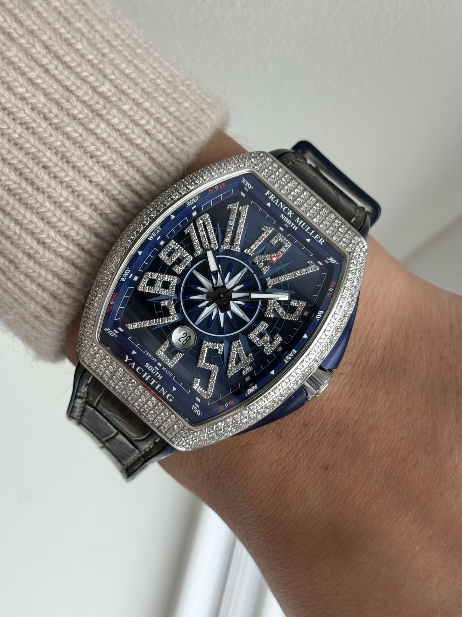 May be an image of wrist watch and text