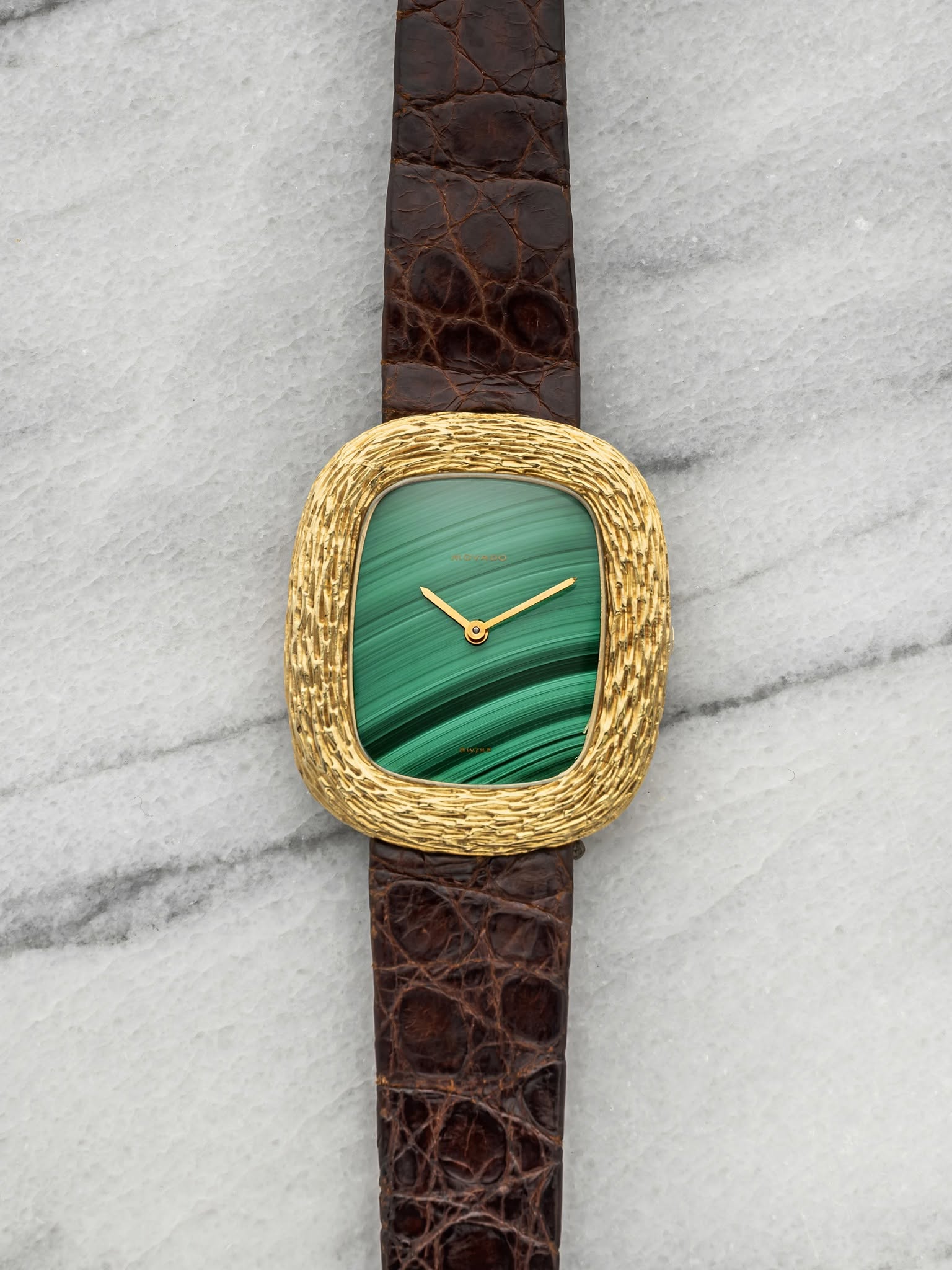 May be an image of wrist watch and leather
