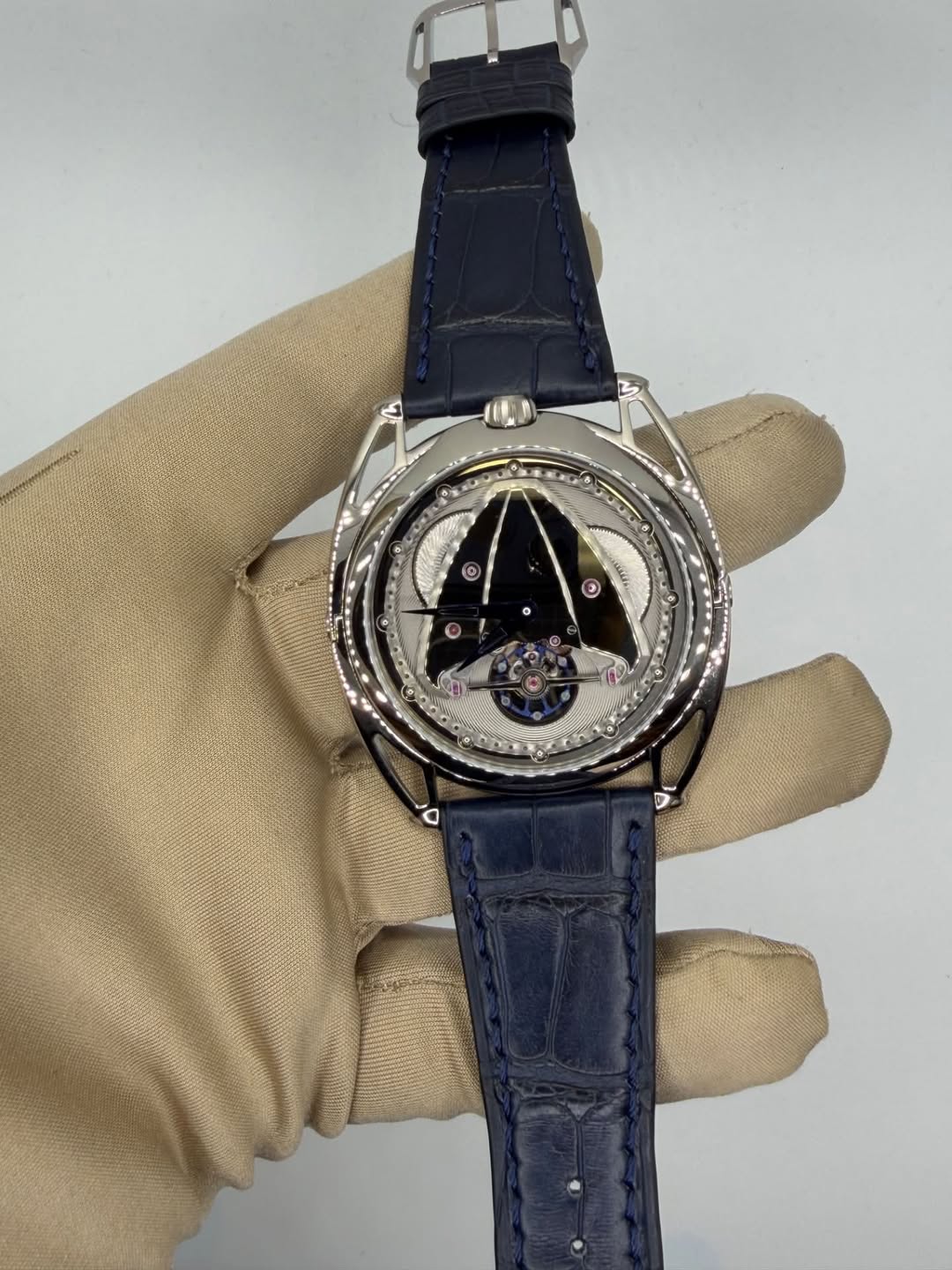 May be an image of wrist watch and text