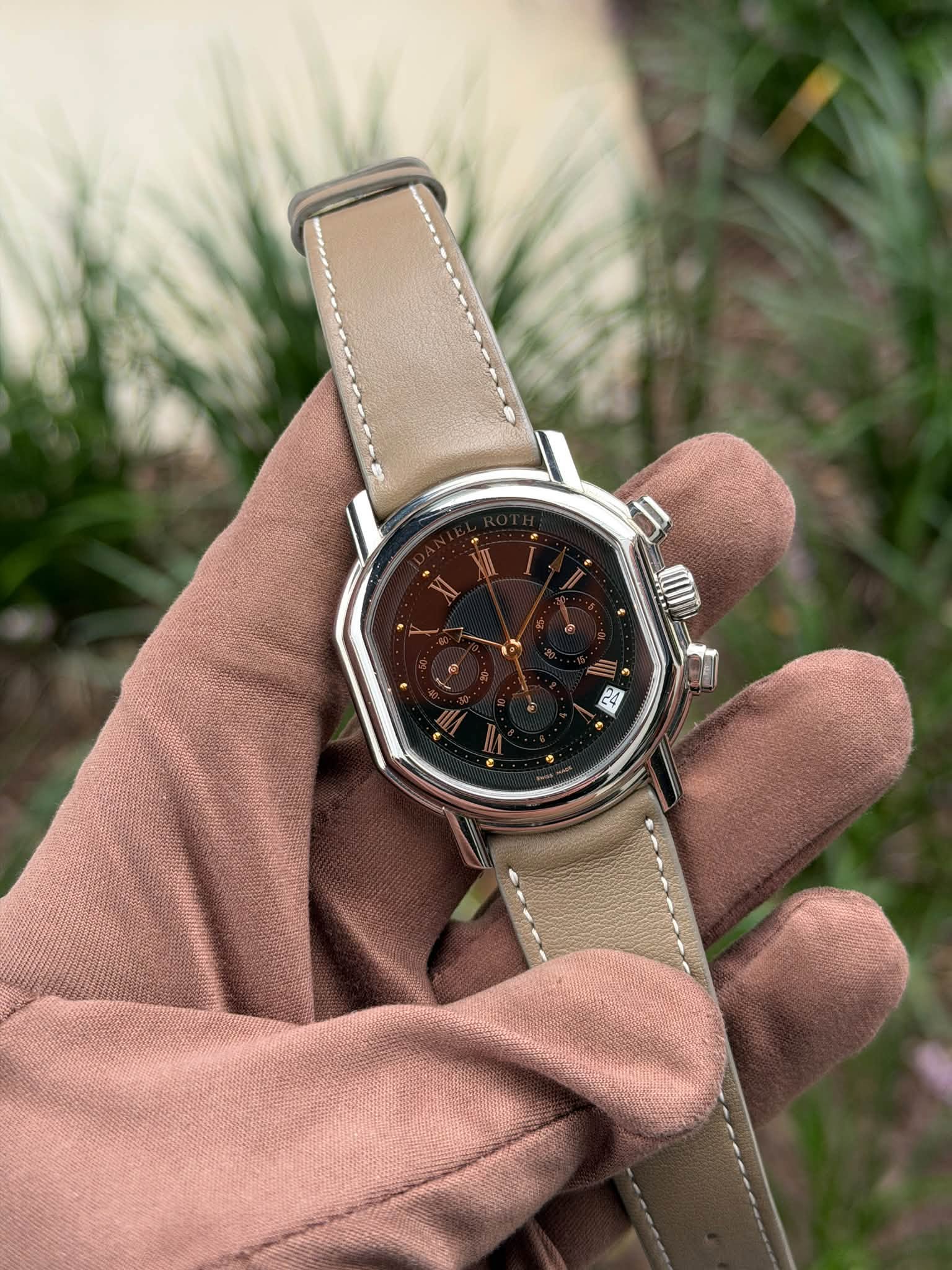May be an image of wrist watch and leather
