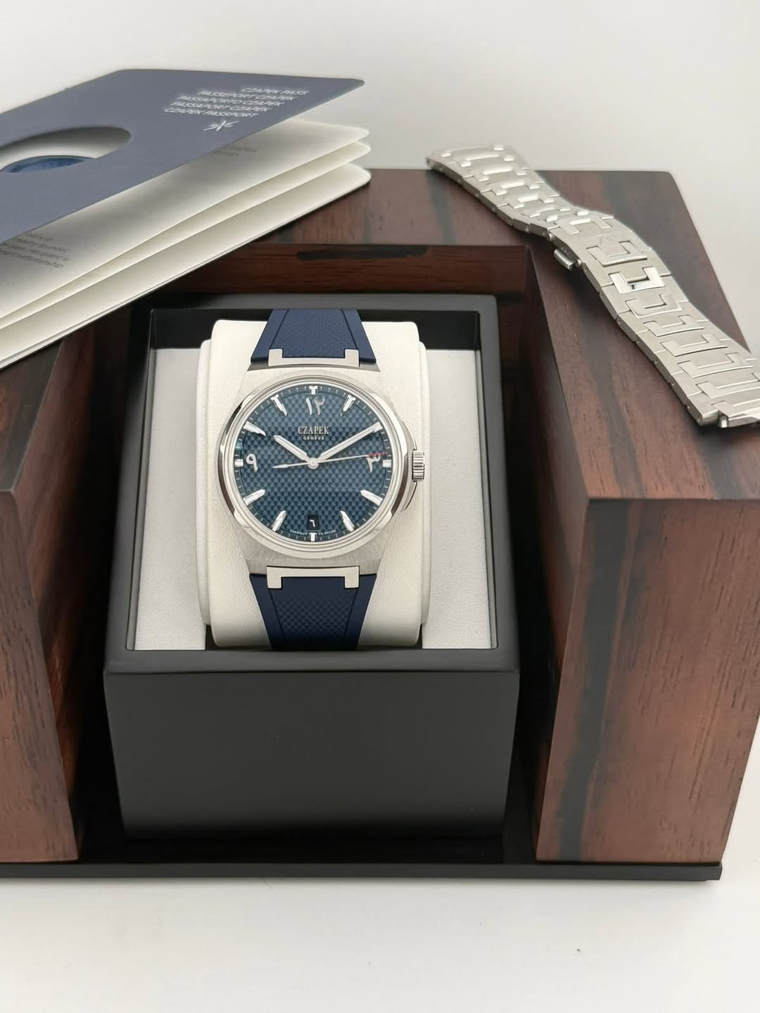 May be an image of wrist watch and text