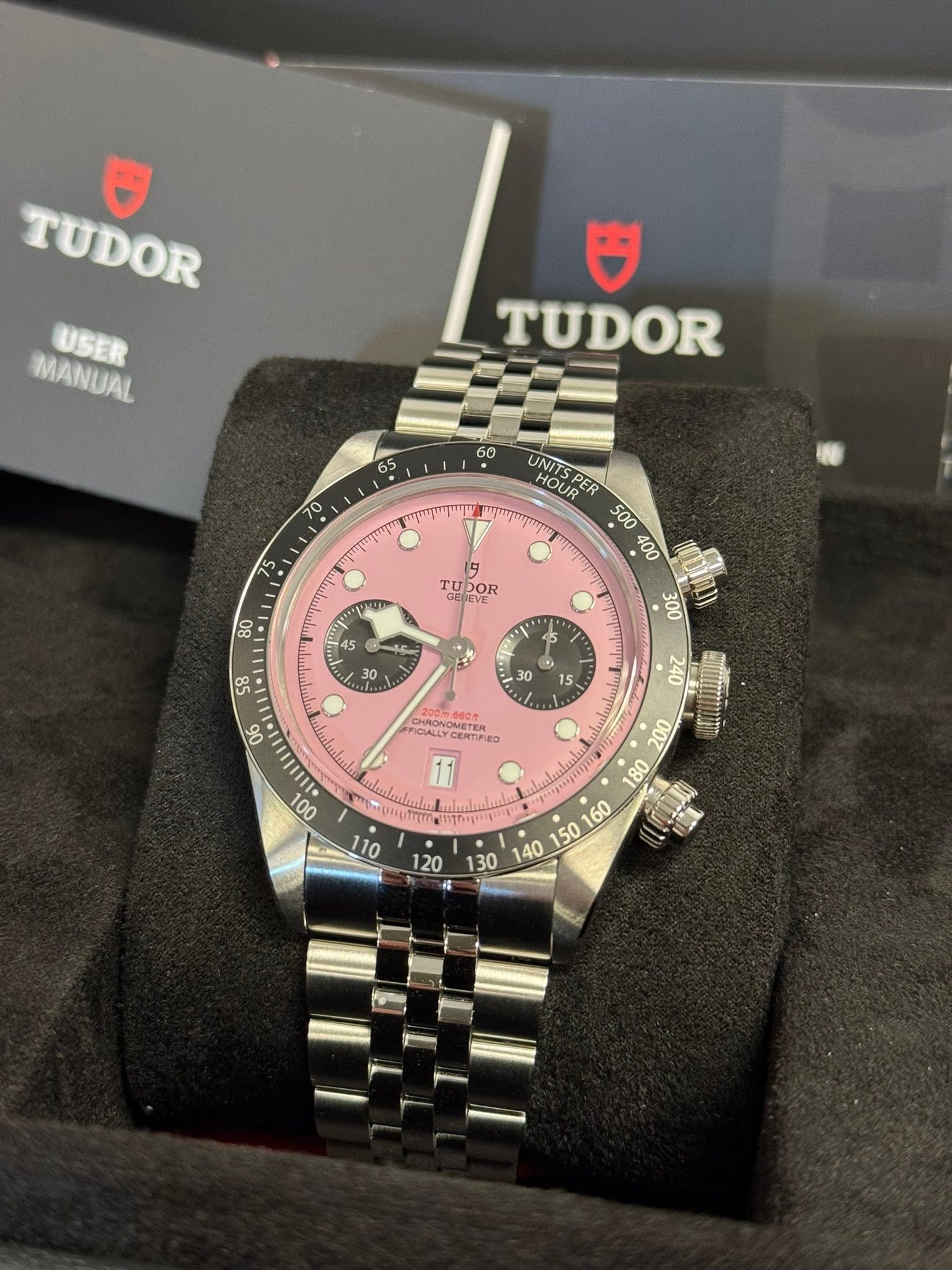 May be an image of wrist watch and text