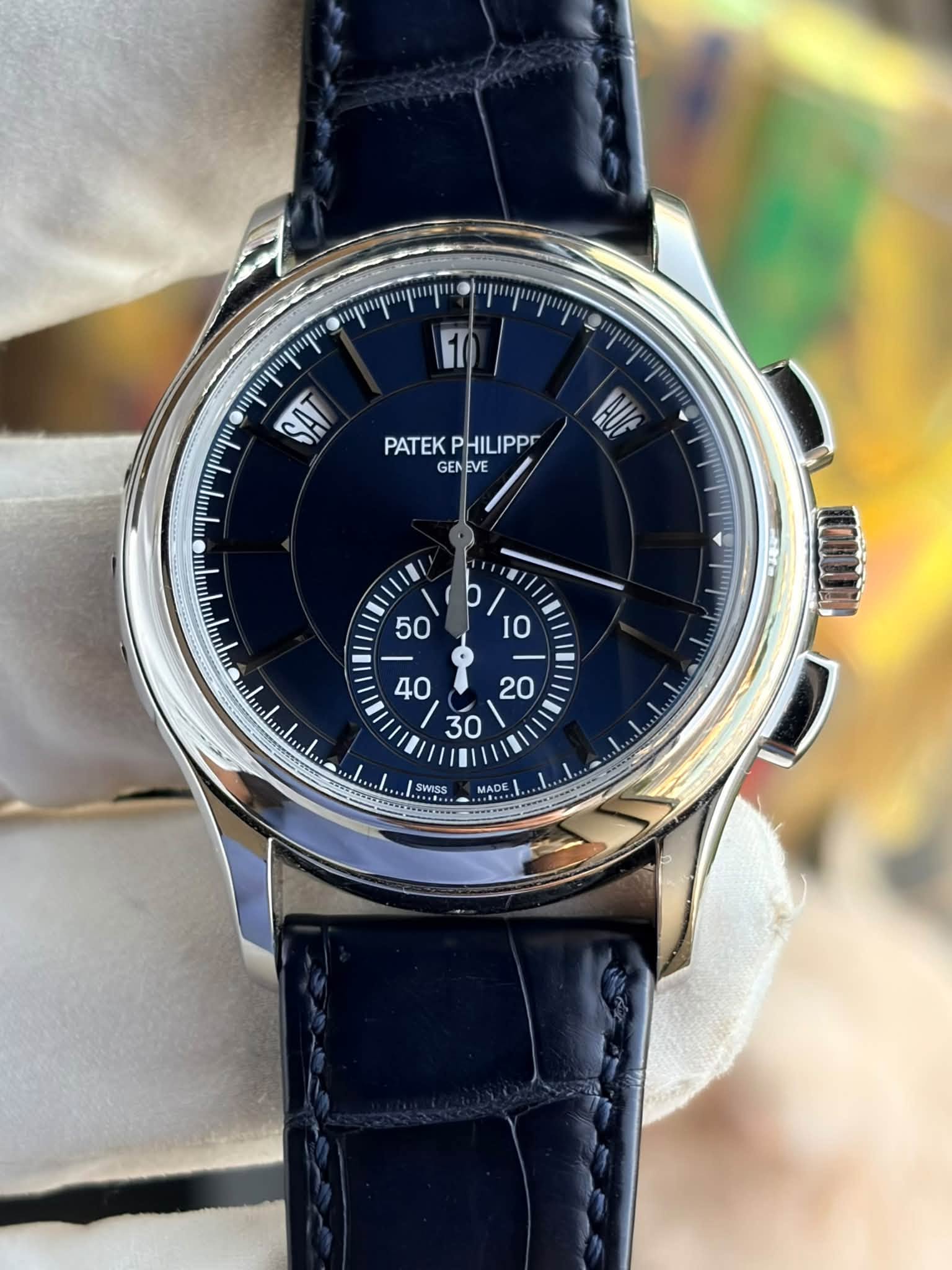 May be an image of wrist watch and text