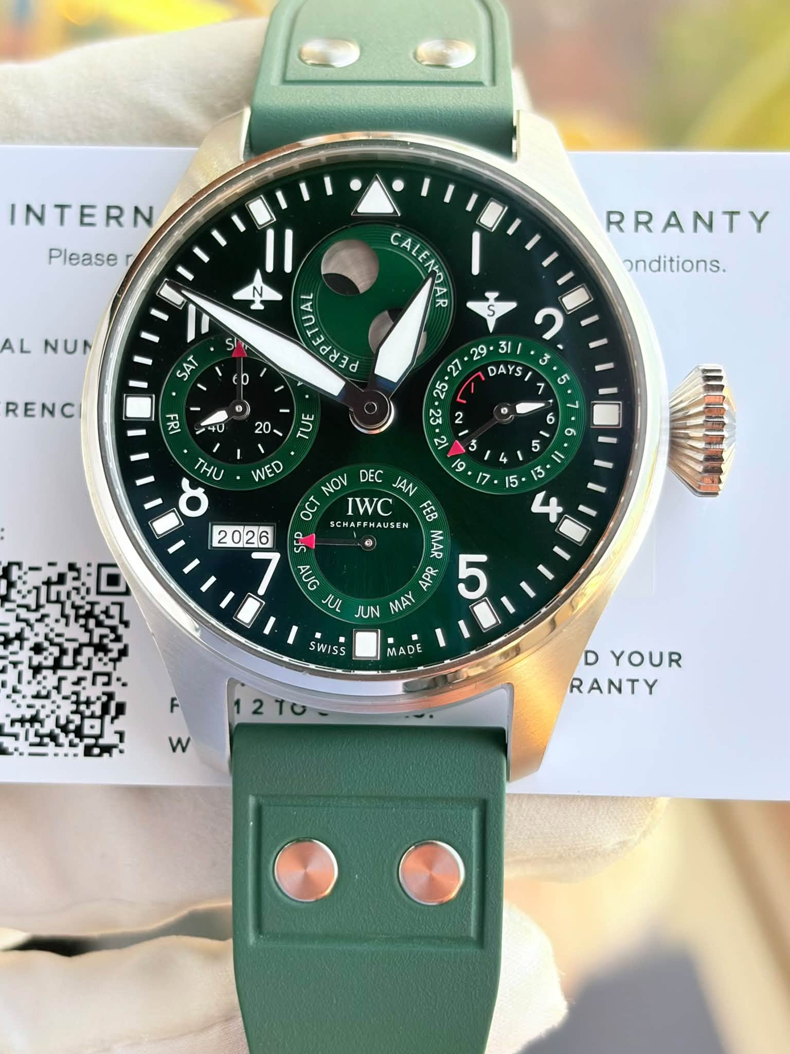 May be an image of wrist watch and text