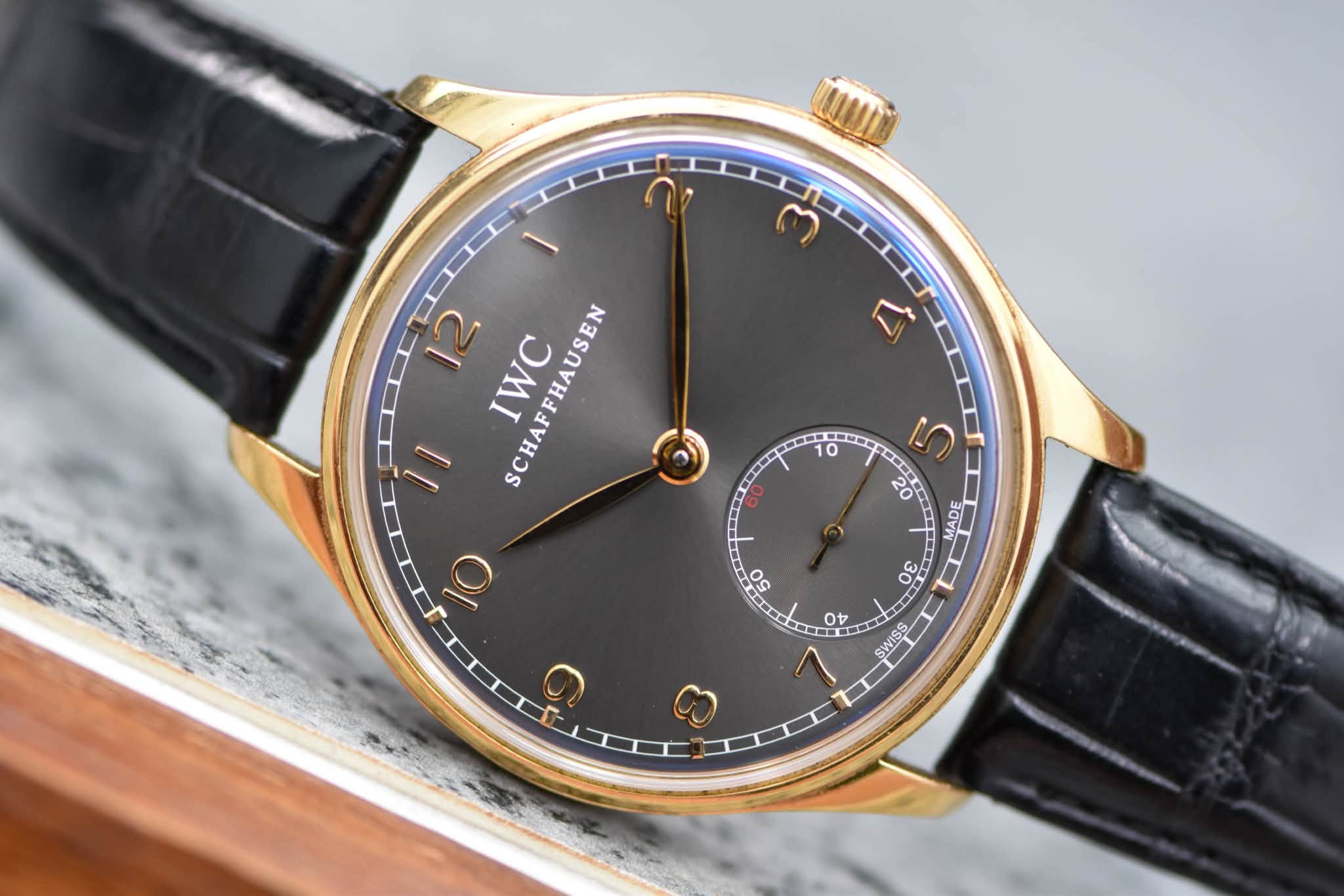 May be an image of wrist watch and text