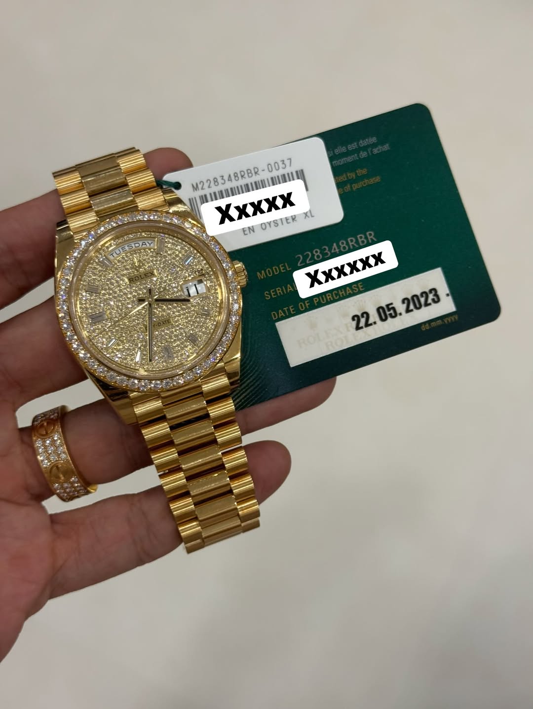 May be an image of wrist watch and text