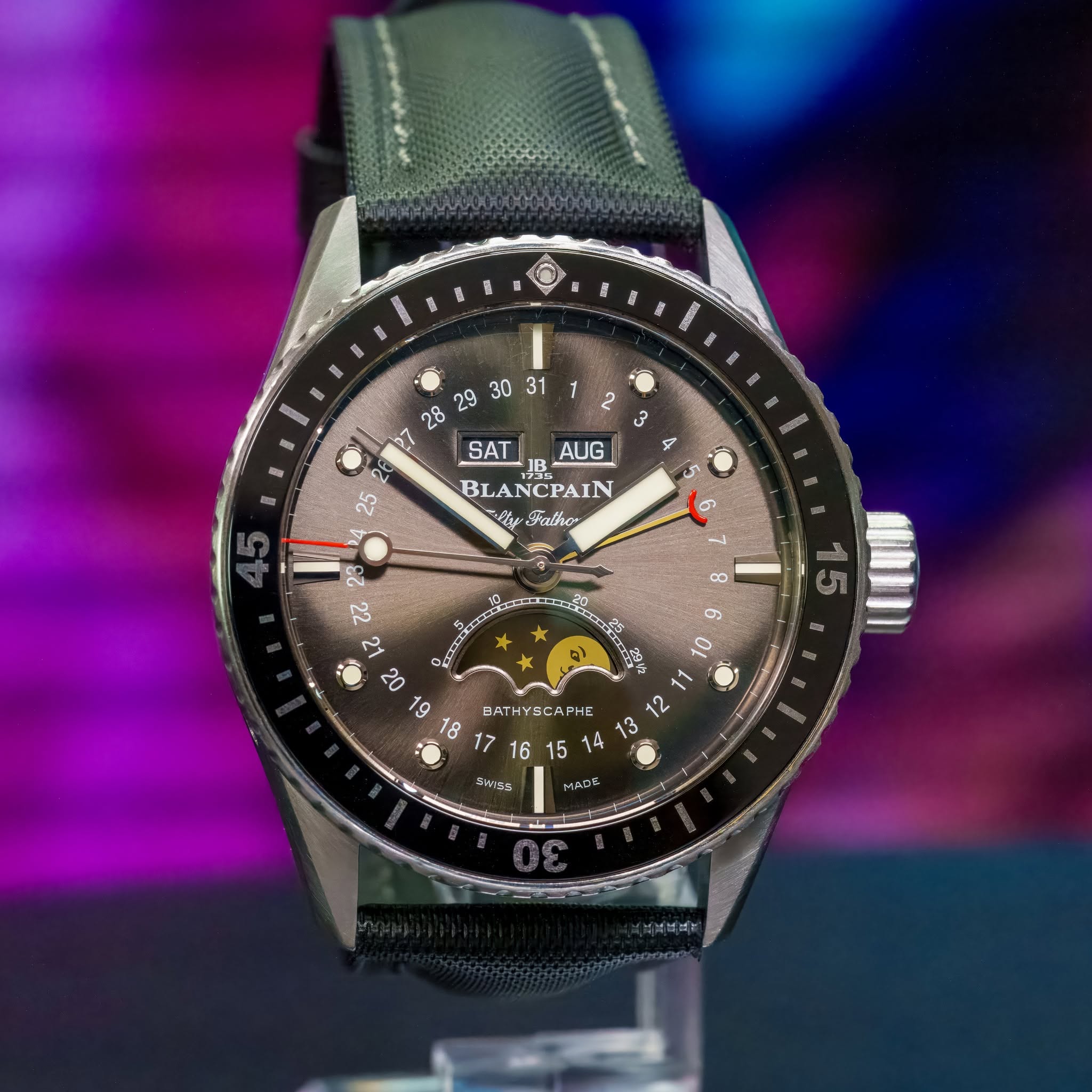 May be an image of wrist watch and text that says ' SAT AUG JB BLANCPAIN 脱岐 Faliher E00ANG 25 6 टर ဆ BATHy3CAPE BAT 크림 MAI SVSA wt'