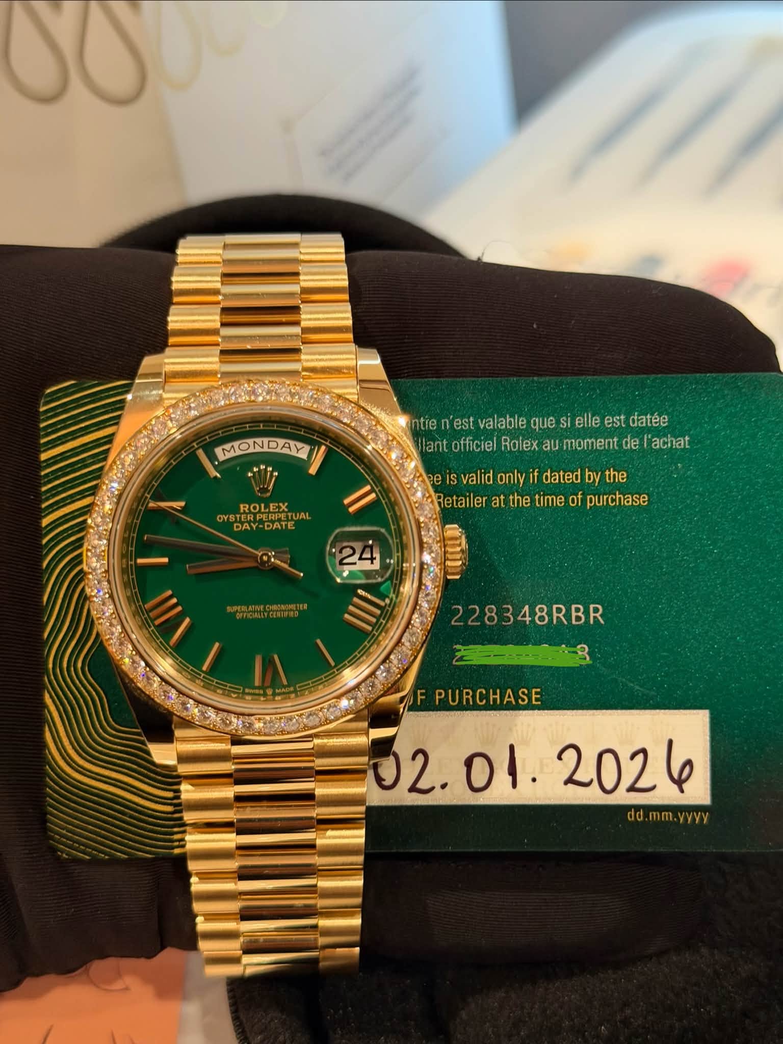 May be an image of wrist watch and text