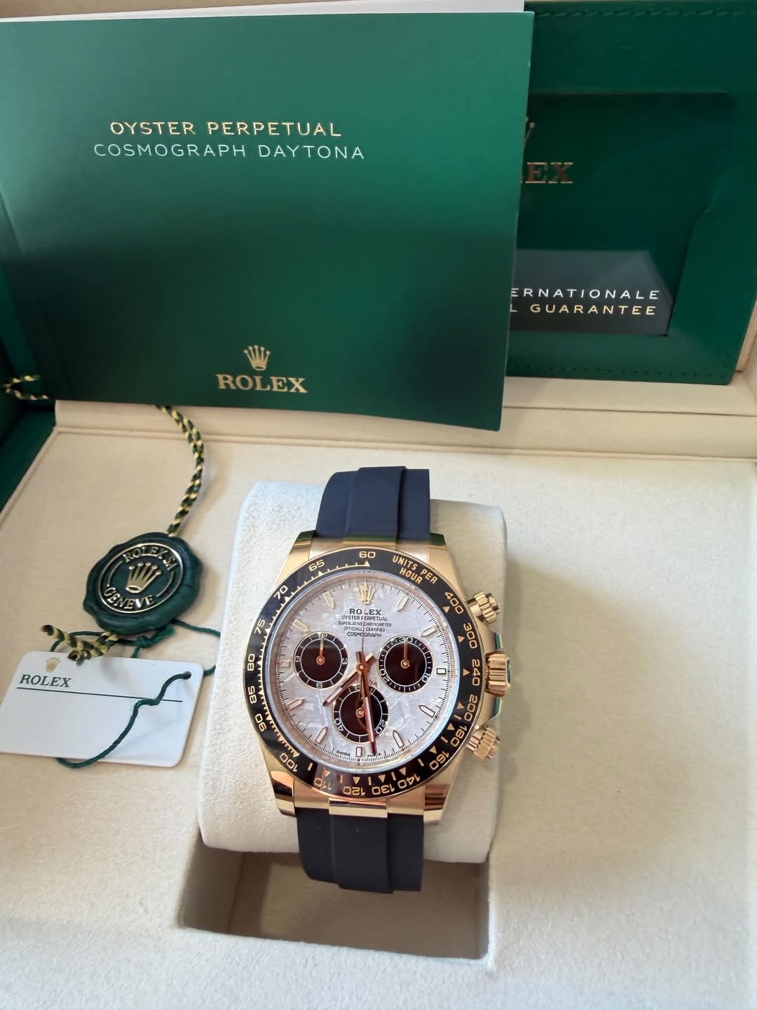May be an image of wrist watch and text