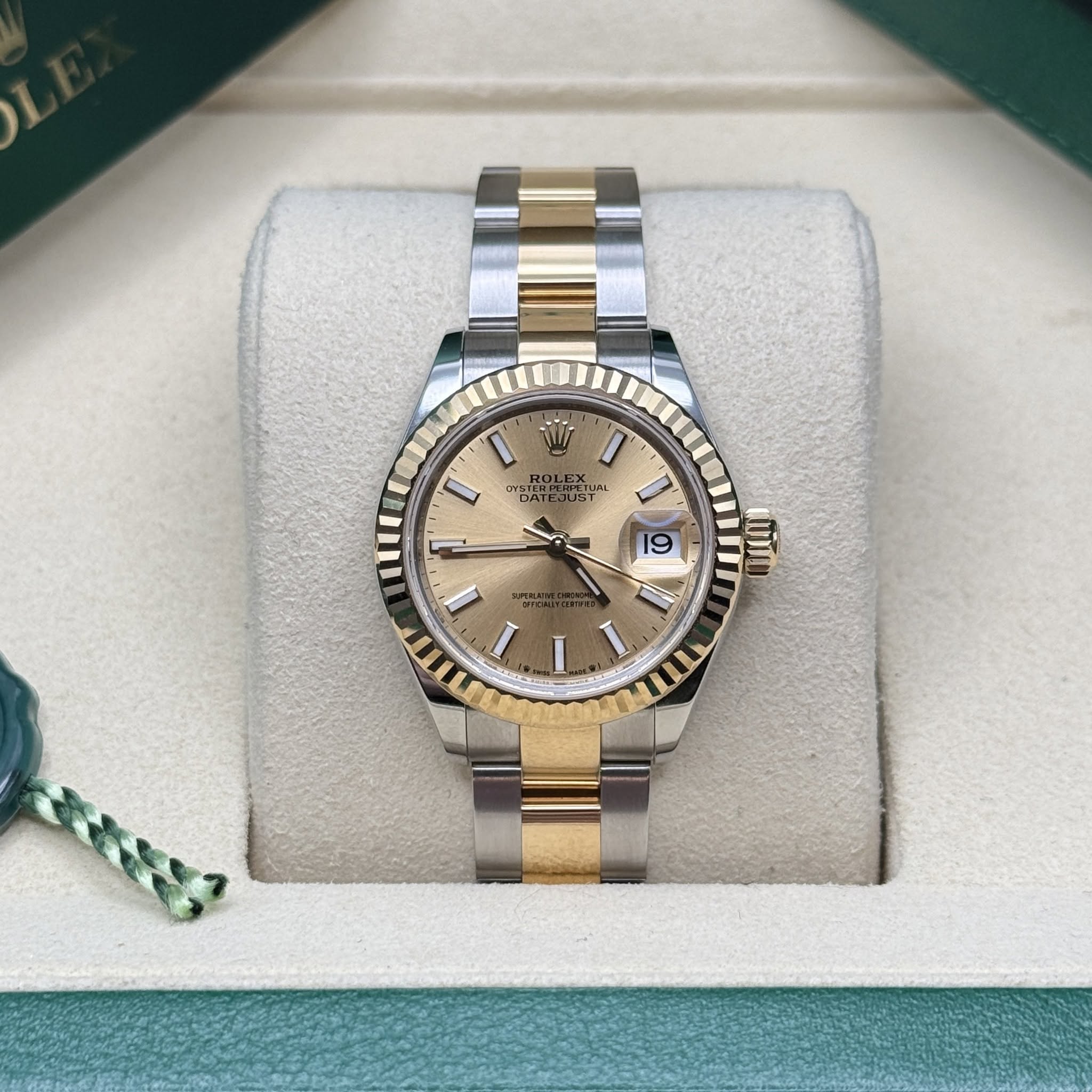 May be an image of wrist watch and text