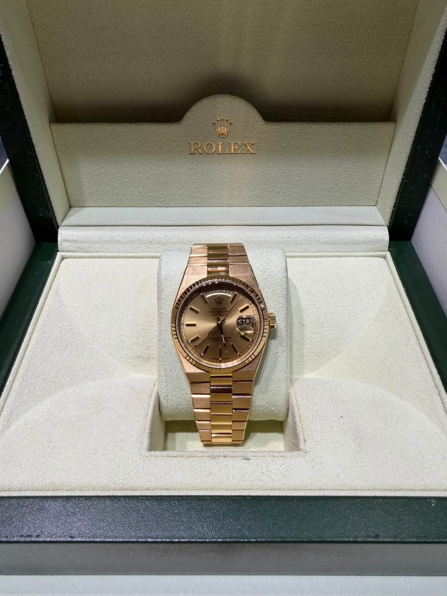 May be an image of wrist watch and text