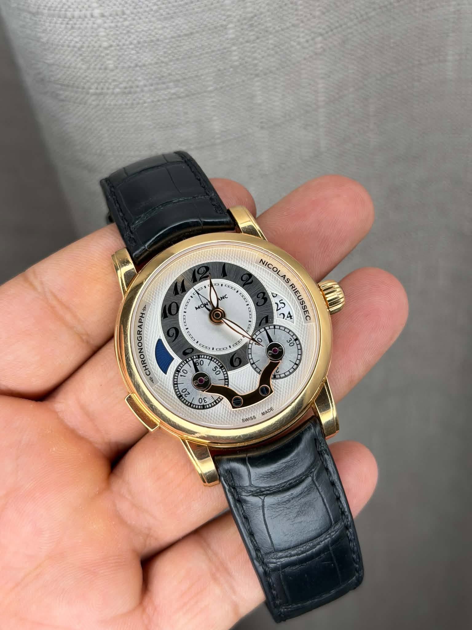 May be an image of wrist watch and text