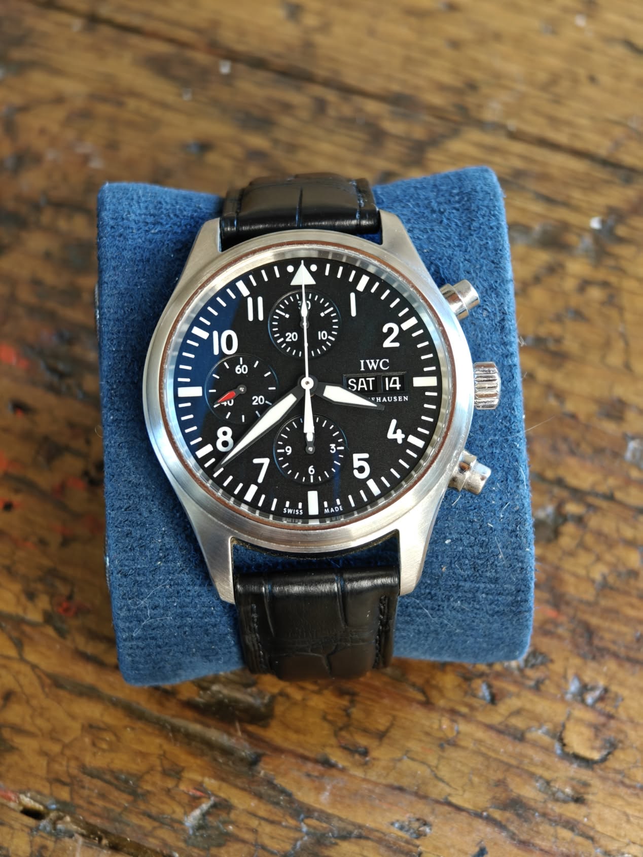 May be an image of wrist watch and text