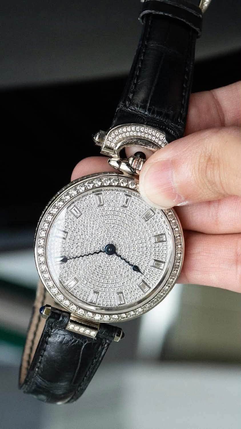 May be an image of wrist watch