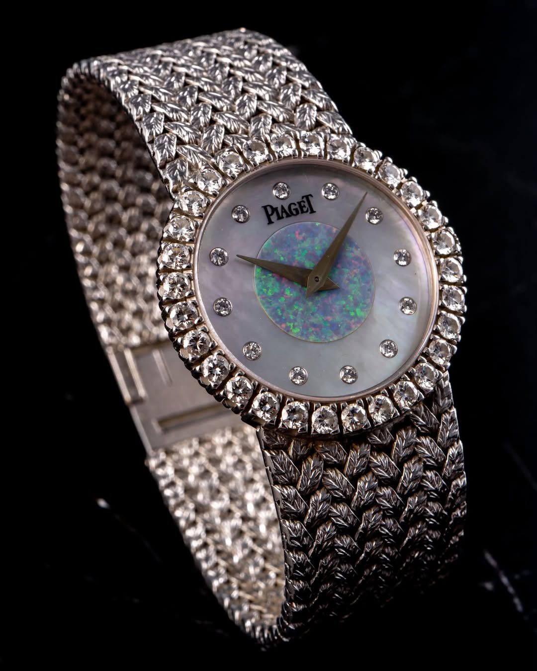 May be an image of wrist watch and jewelry