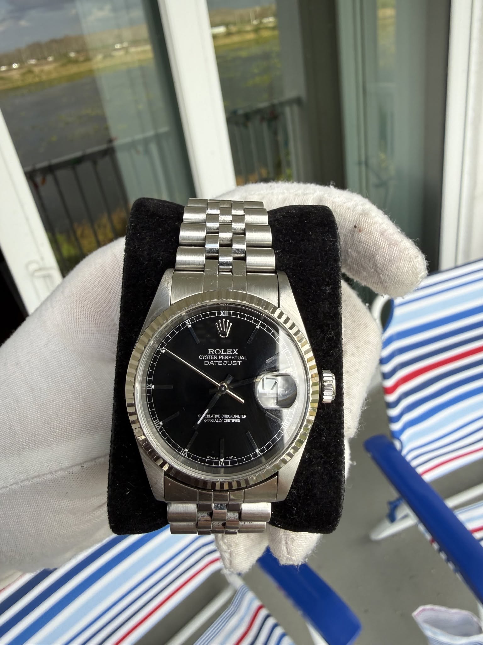 May be an image of wrist watch and text