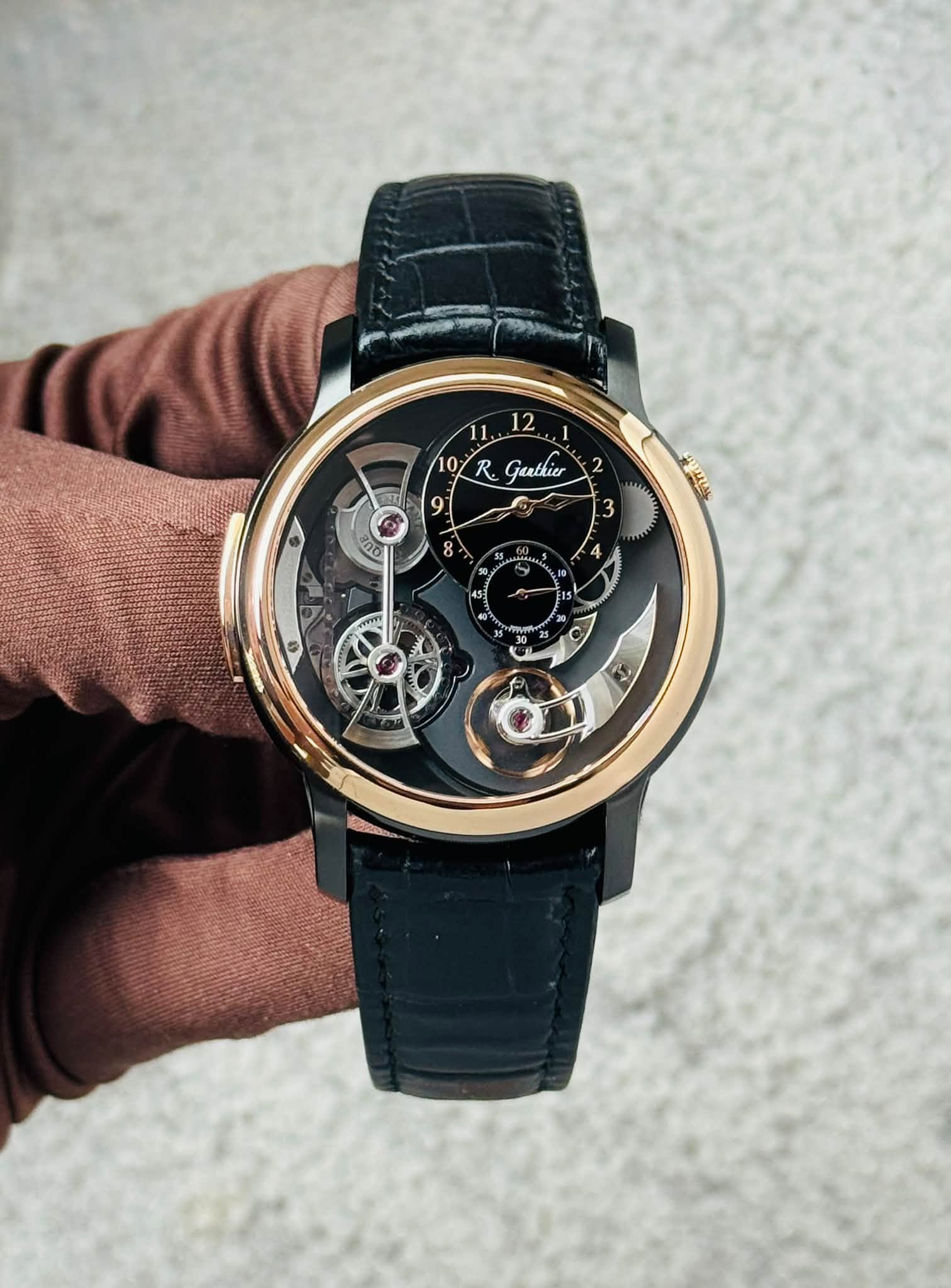 May be an image of wrist watch and text