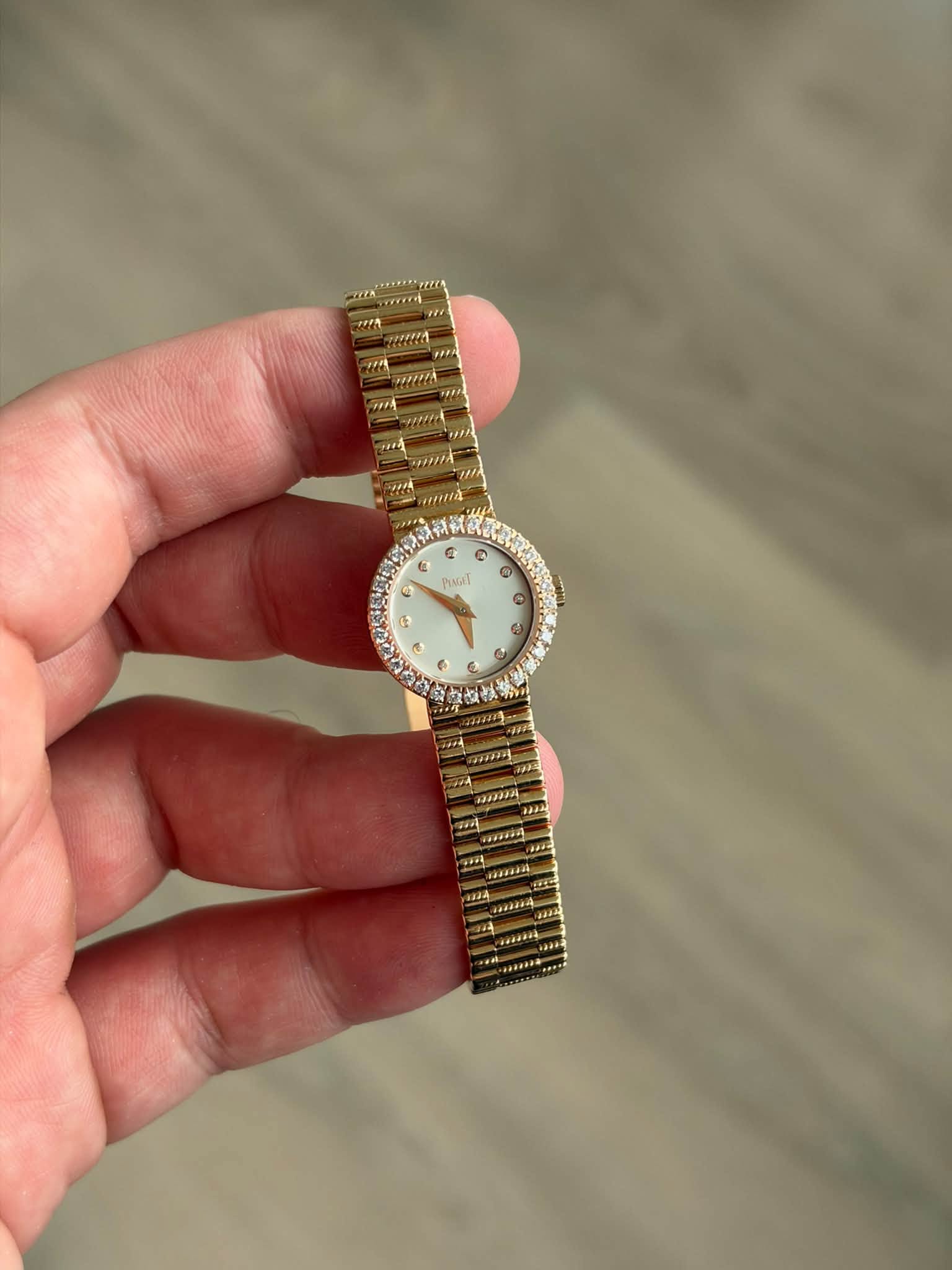 May be an image of wrist watch