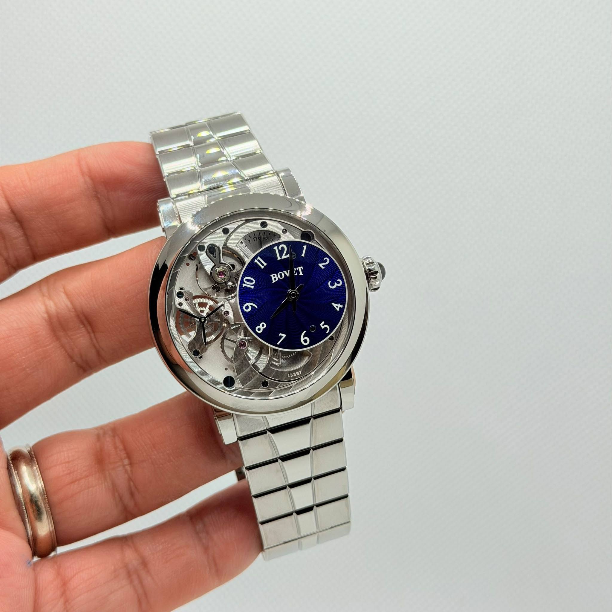 May be an image of wrist watch and text