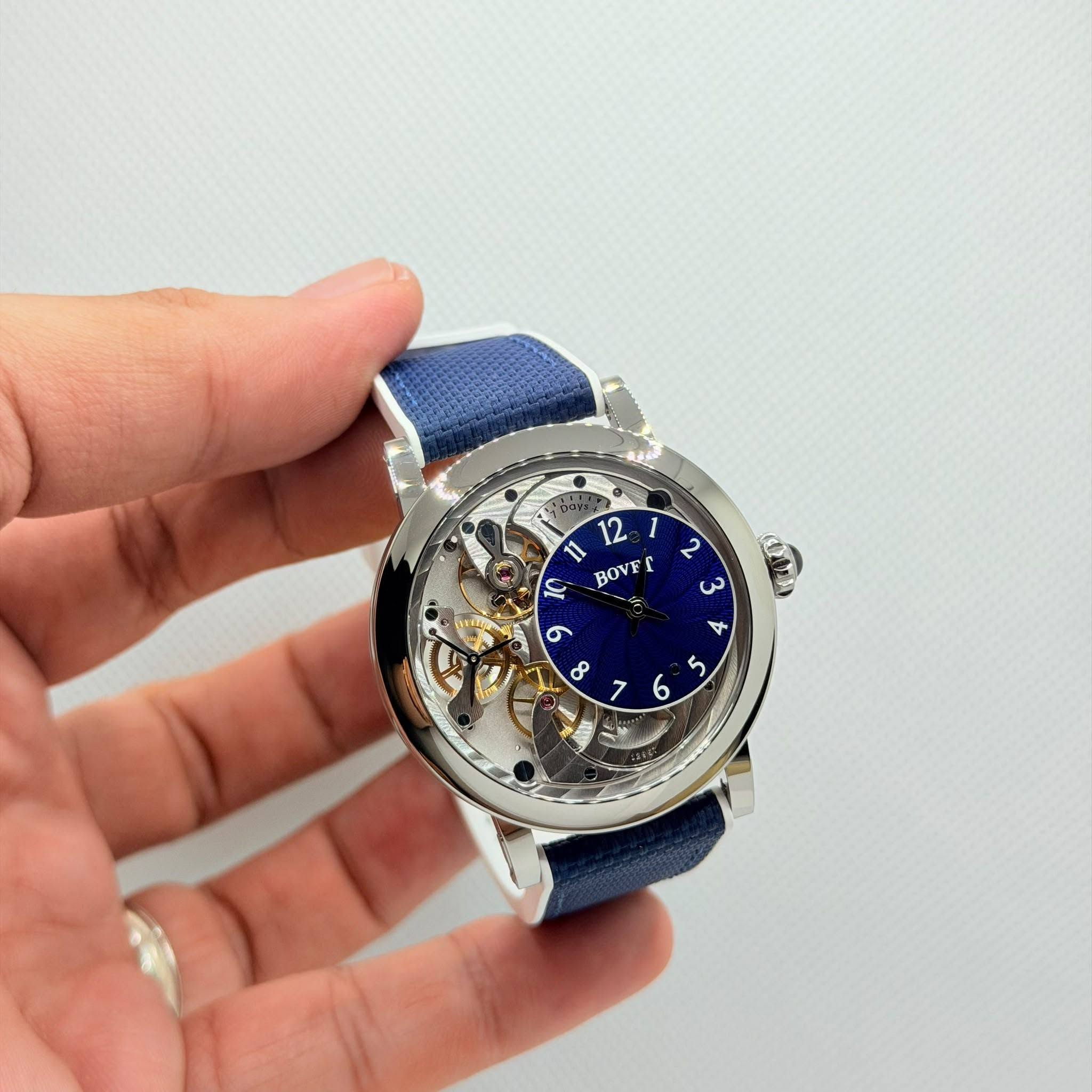 May be an image of wrist watch and text