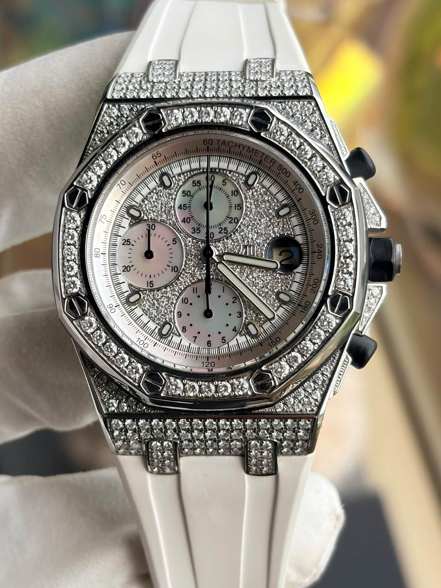 May be an image of wrist watch and text