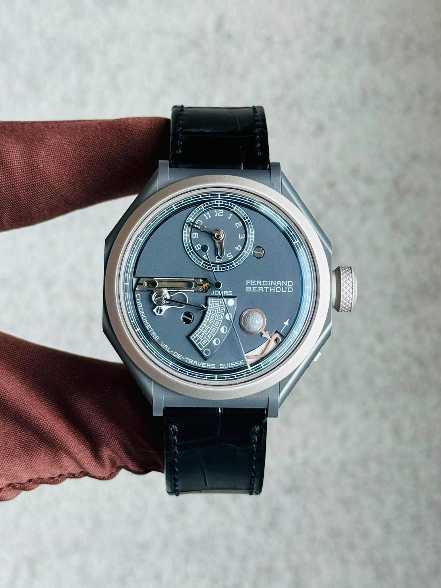 May be an image of wrist watch and text