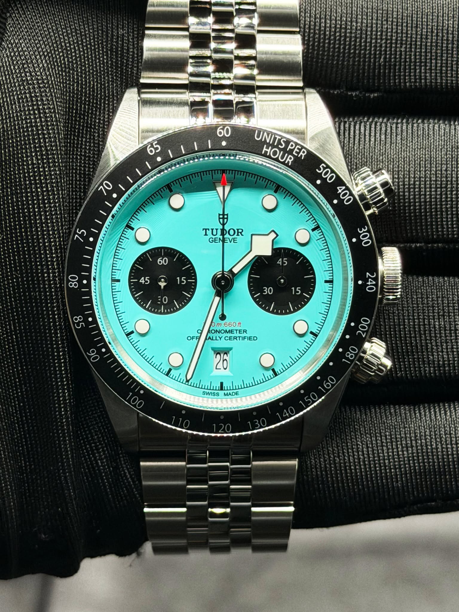 May be an image of wrist watch and text