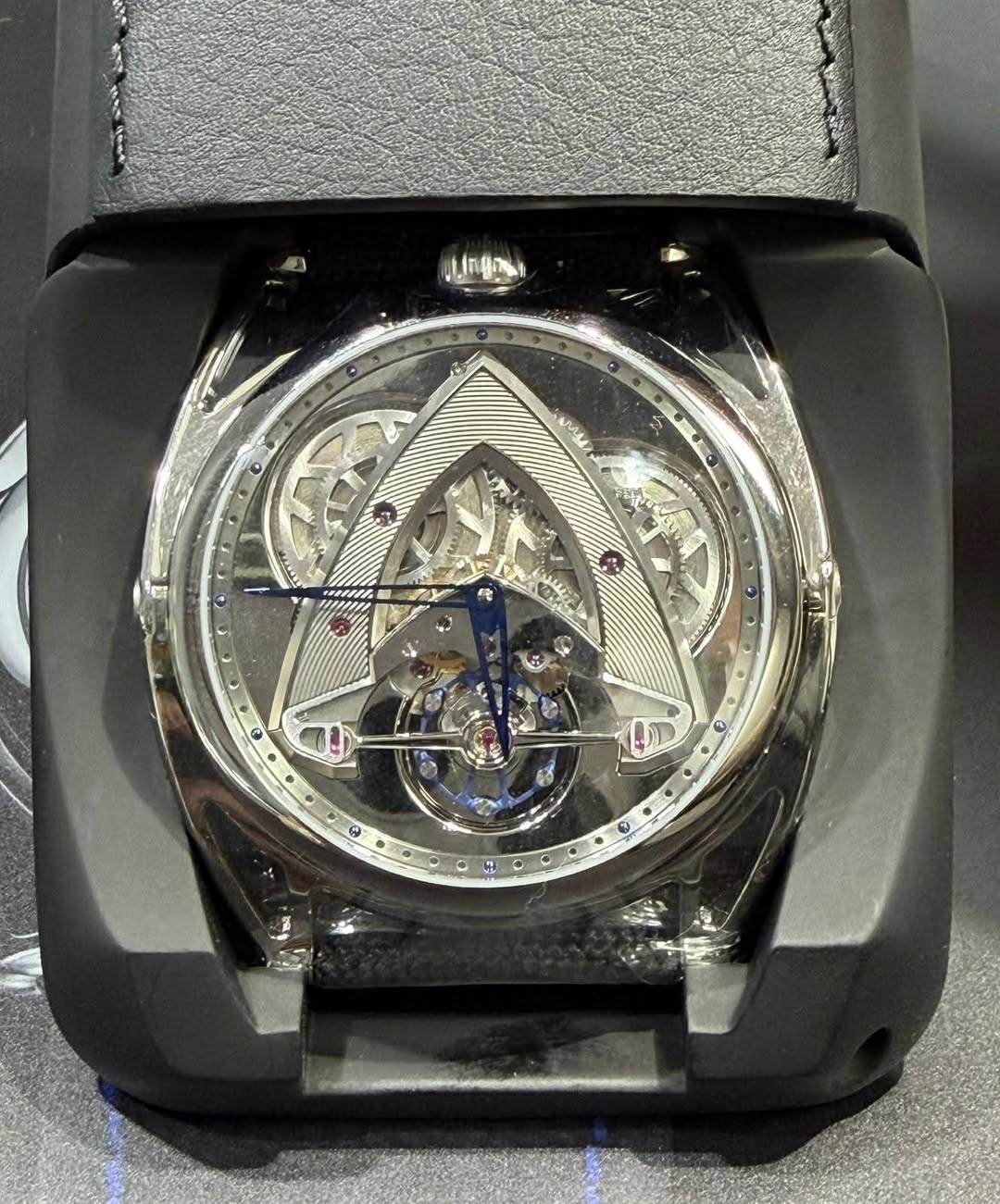 May be an image of wrist watch and text