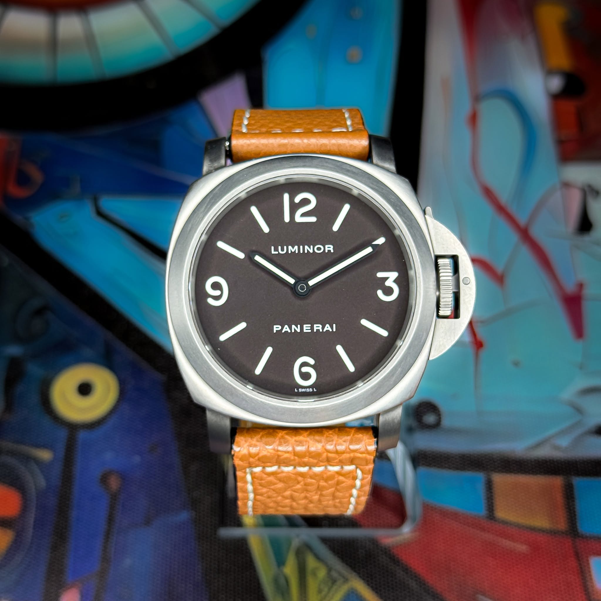 May be an image of wrist watch and text