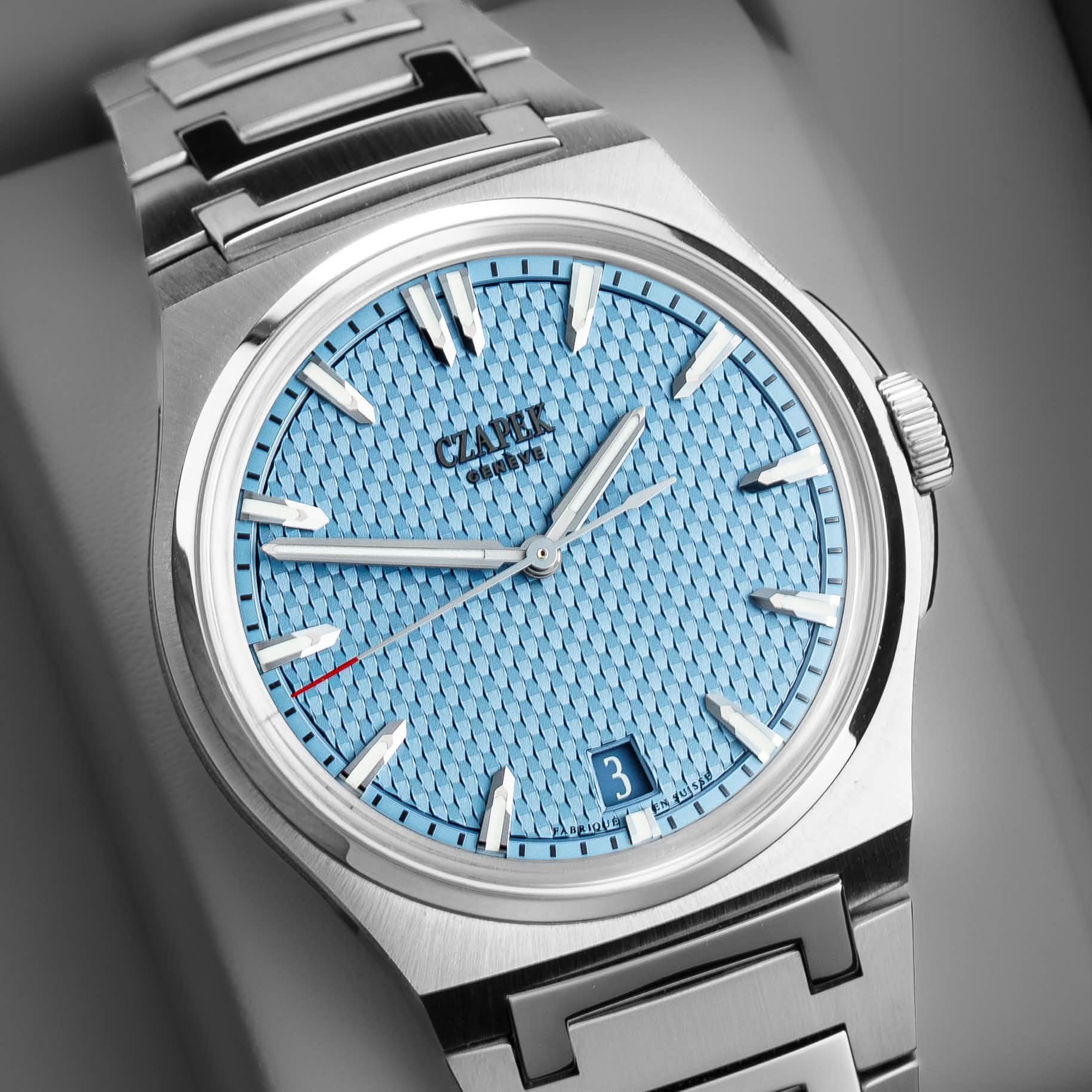 May be an image of wrist watch and text