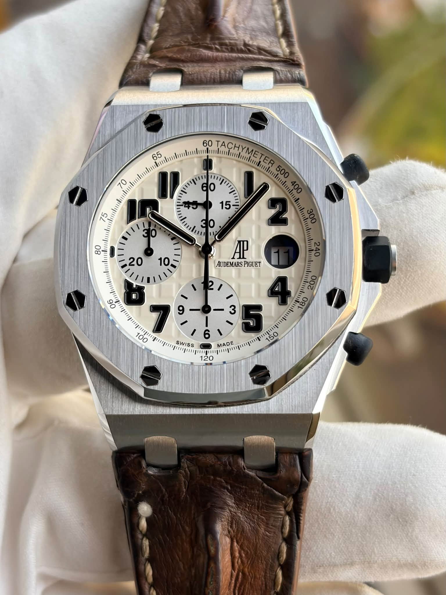 May be an image of wrist watch and text