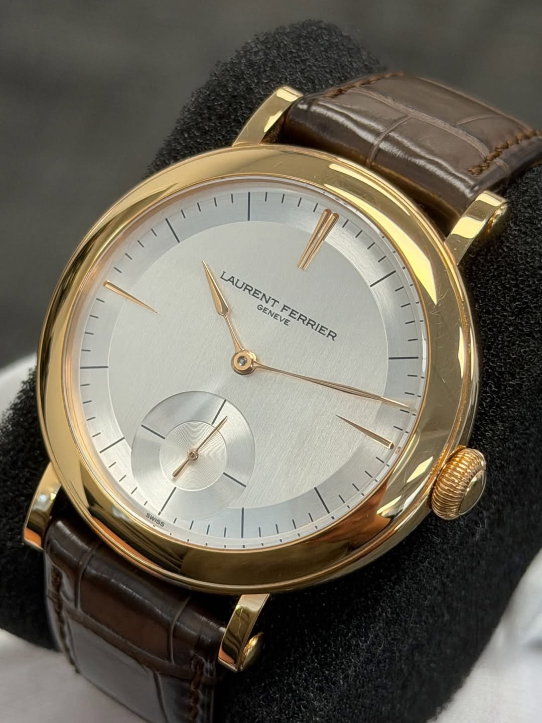May be an image of wrist watch and text