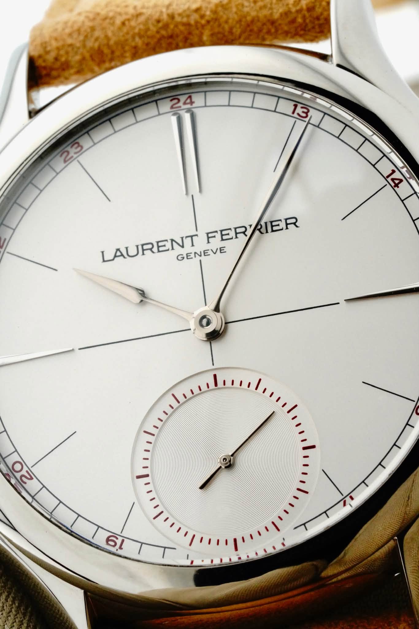 May be an image of wrist watch and text