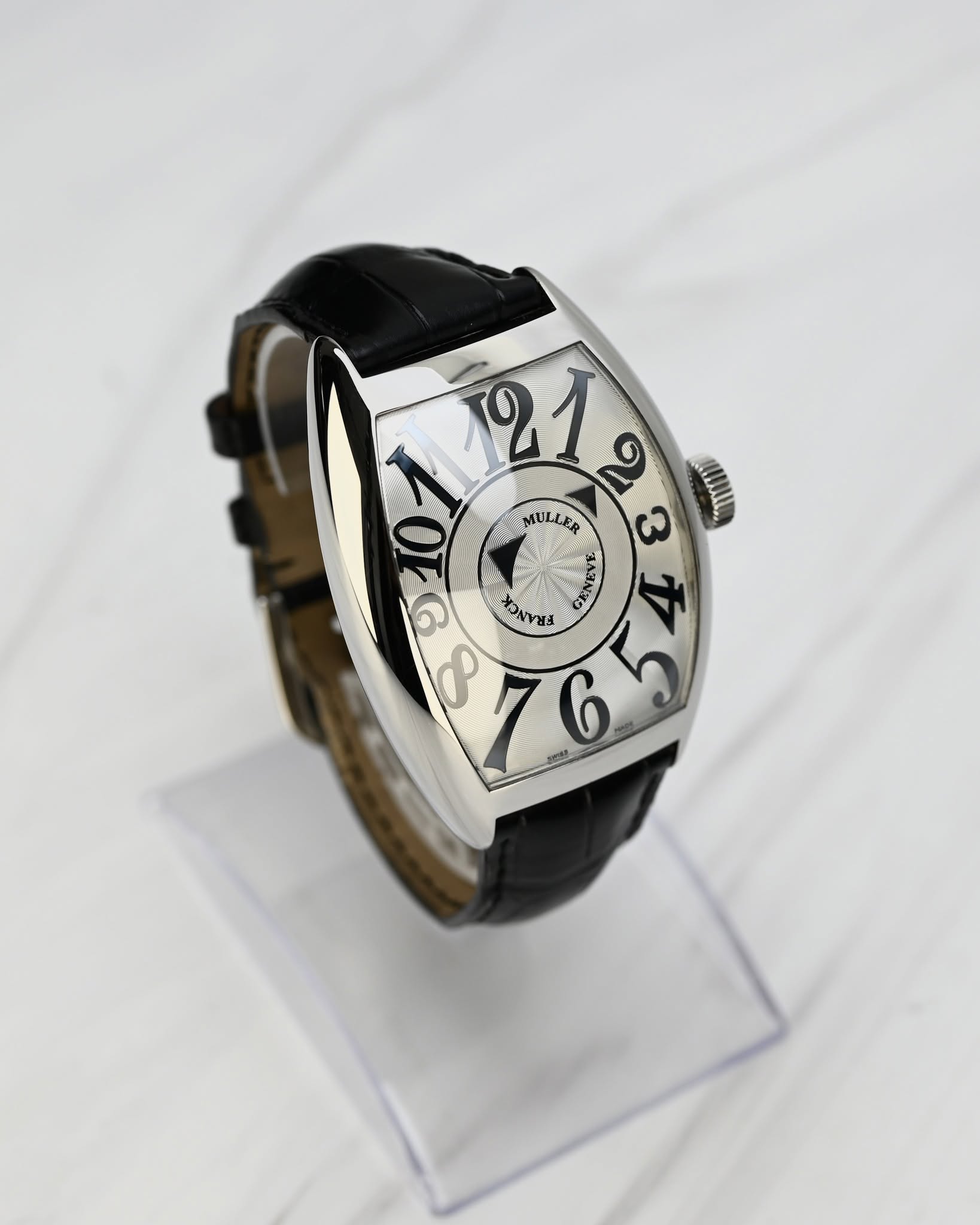 May be an image of wrist watch and text