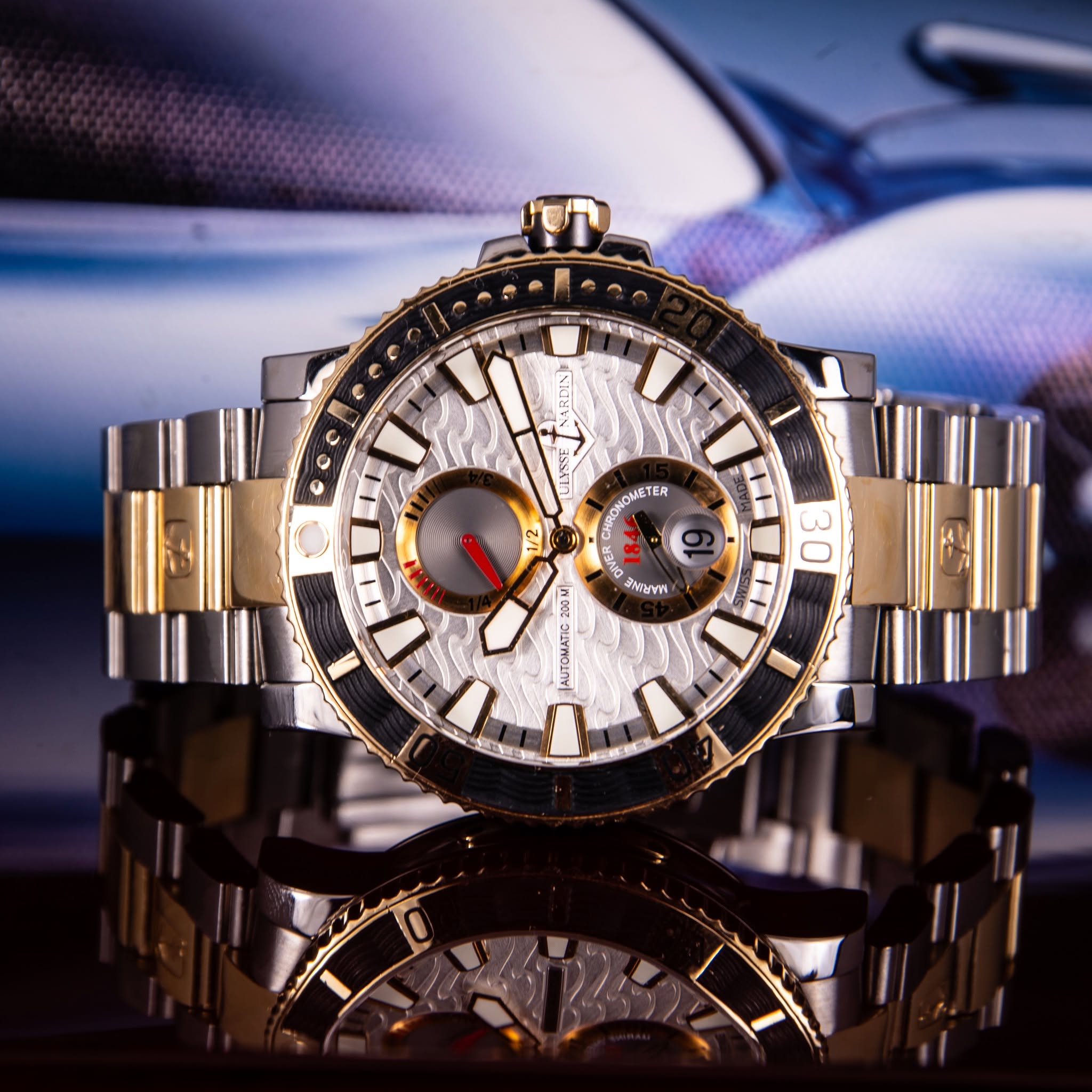 May be an image of wrist watch and text