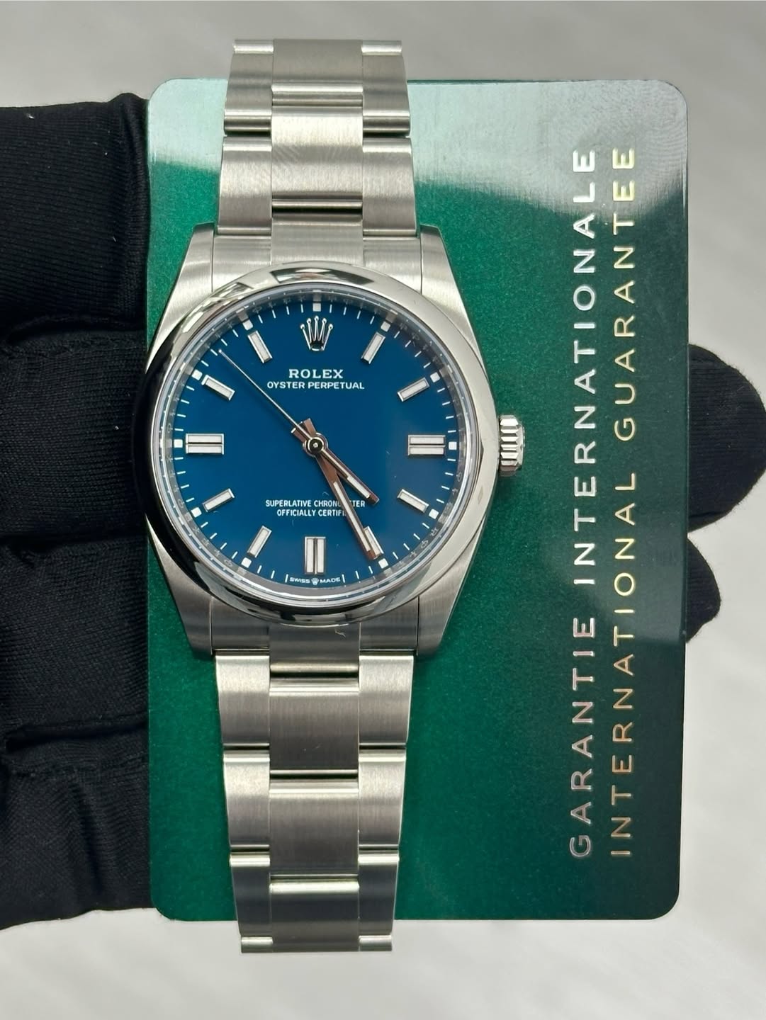 May be an image of wrist watch and text that says 'ROLEX EX OYSTER STERPERPETU PERPET TUAL 10 D CHRON OFFICIALLYCERT CERTIF Swss MADE ALE wy TE INTERNA A N INTERNATIONALI RNATION…