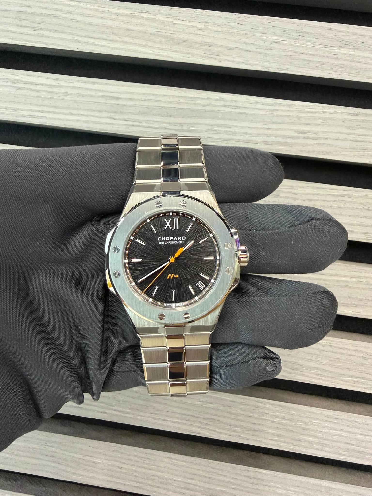 May be an image of wrist watch and text