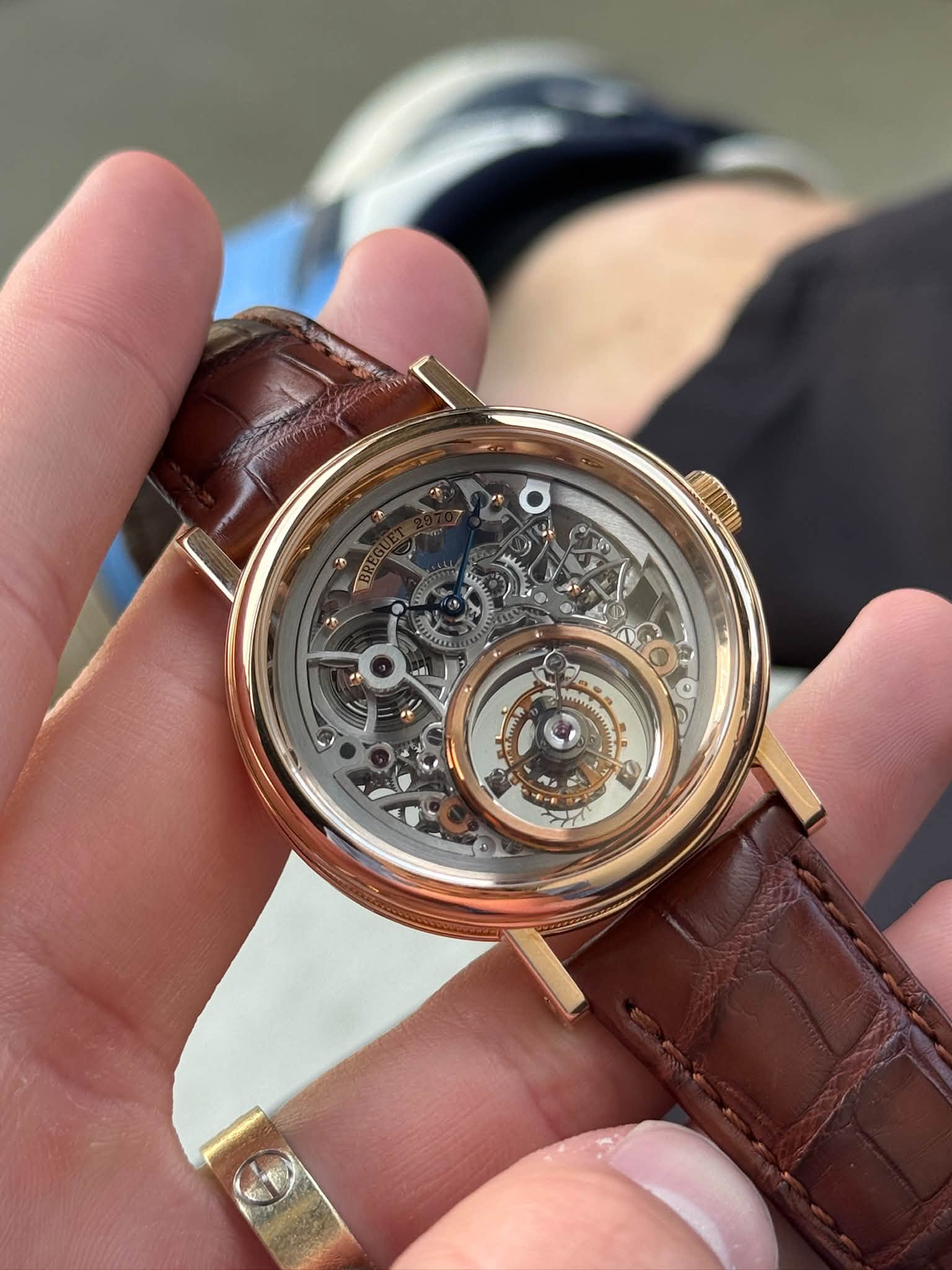 May be an image of wrist watch and text