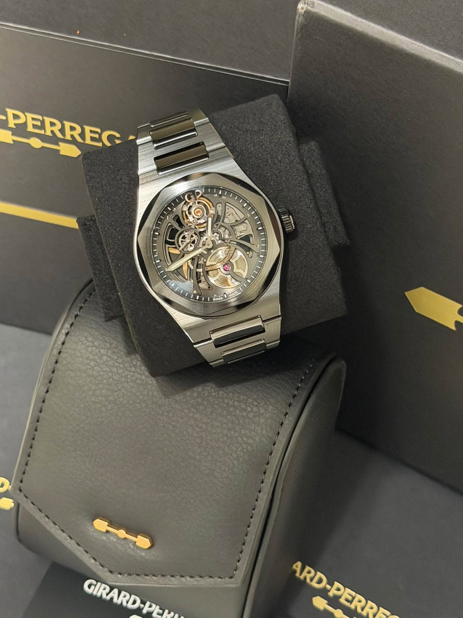 May be an image of wrist watch and text