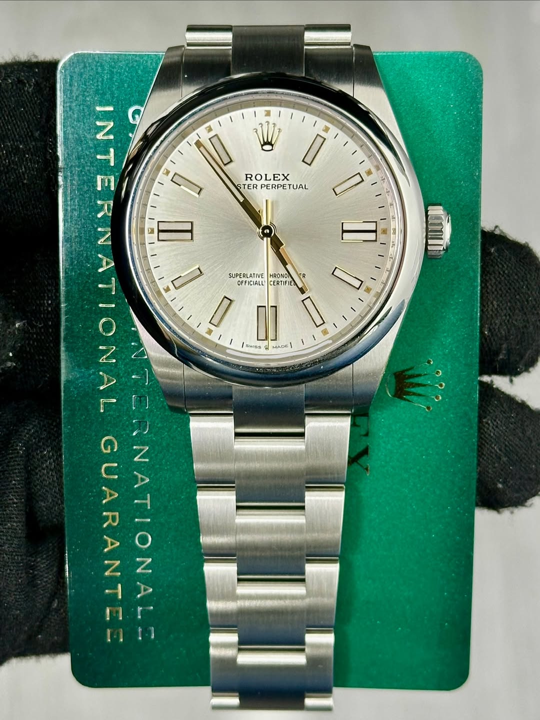 May be an image of wrist watch and text