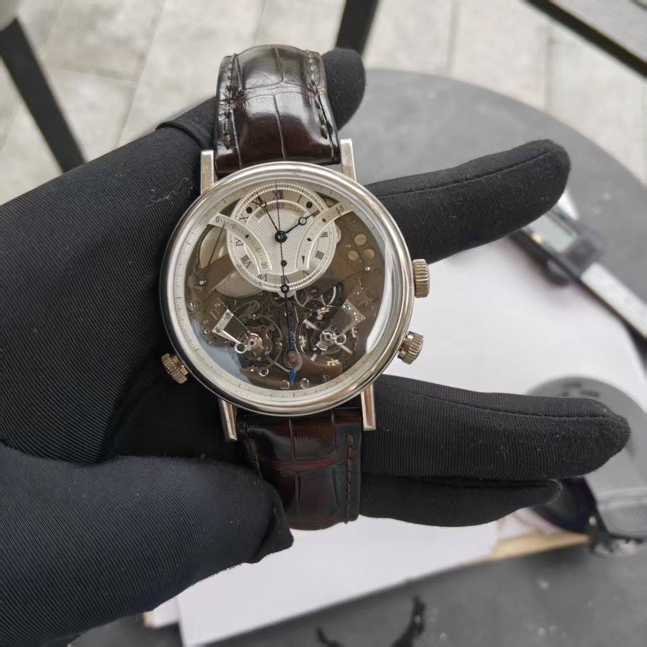 May be an image of wrist watch