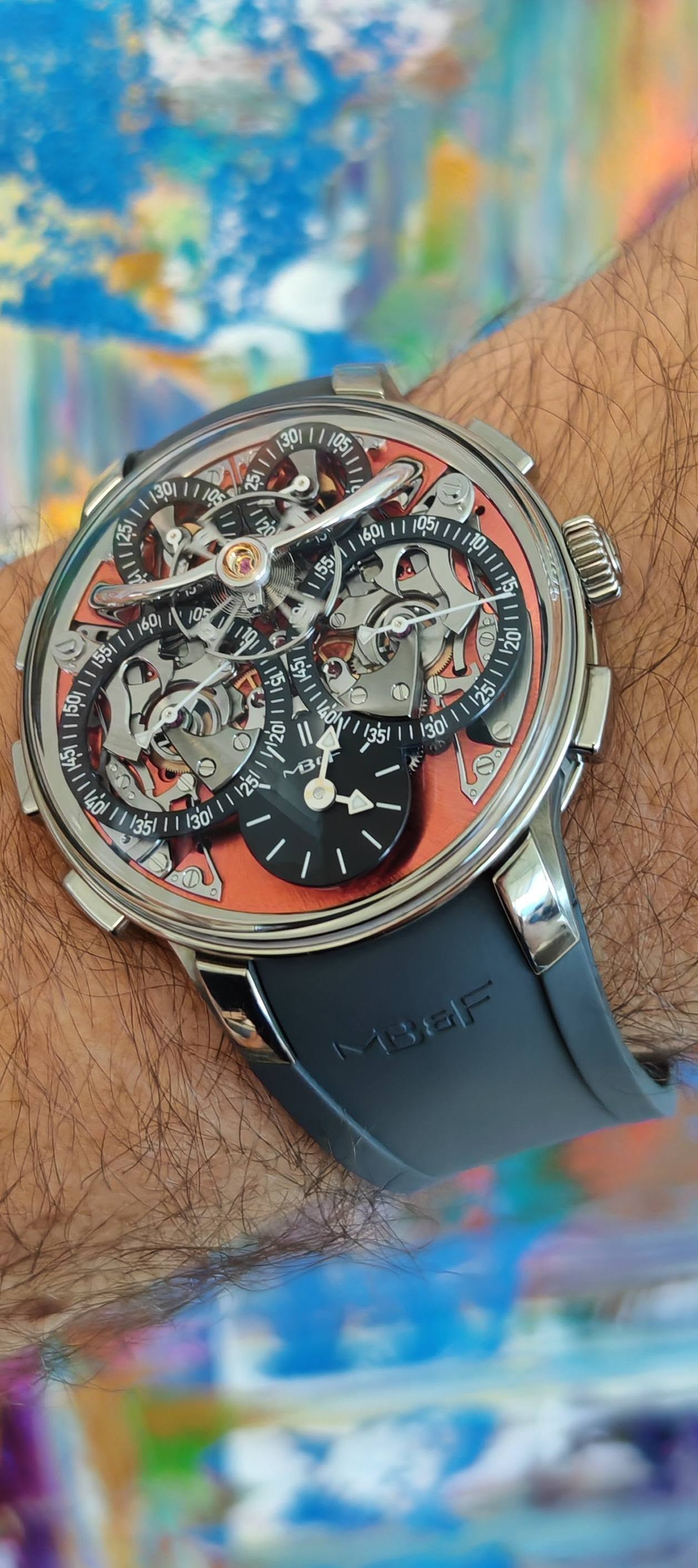 May be an image of wrist watch and text