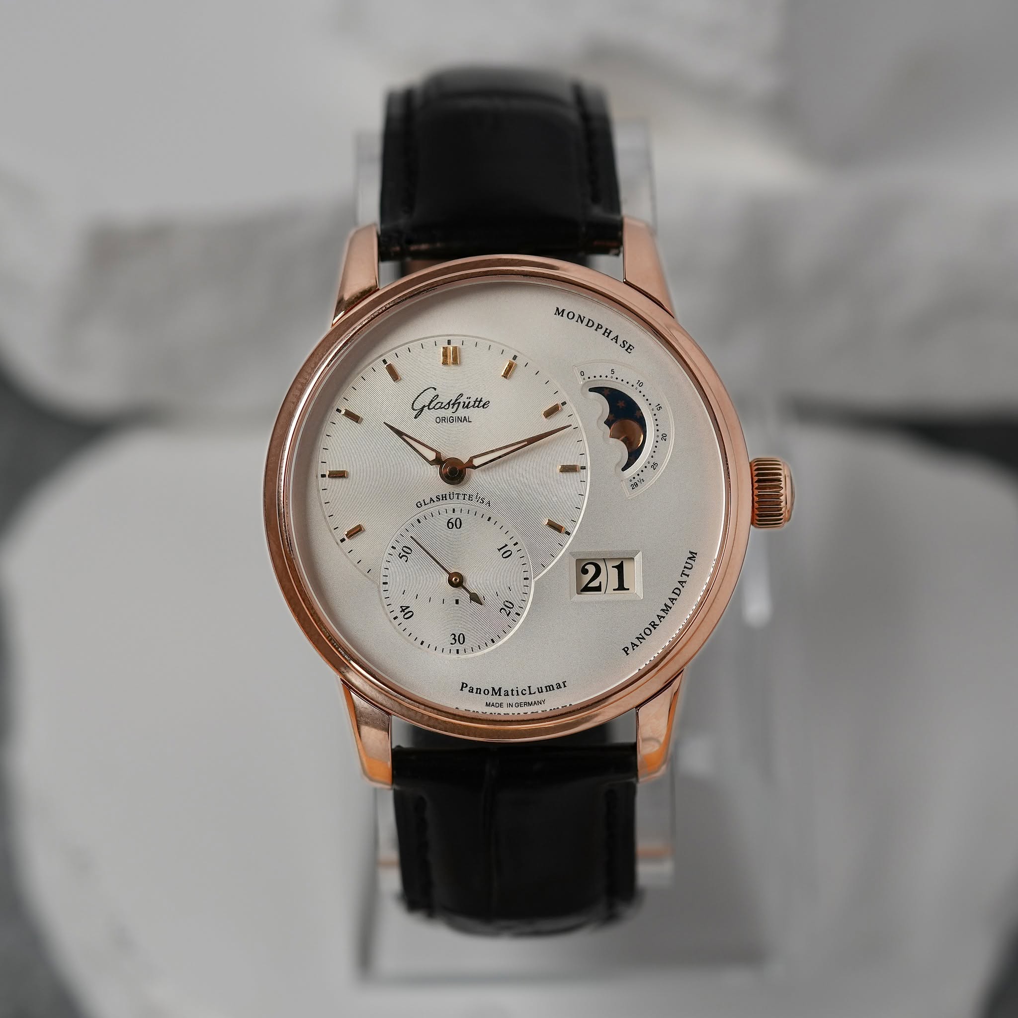 May be an image of wrist watch and text